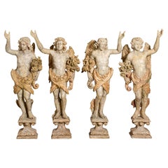 Group of Four Carved Wood / Gesso Winged Angels