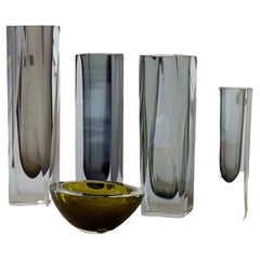 Group of Four Charcoal Vases and an Ashtray