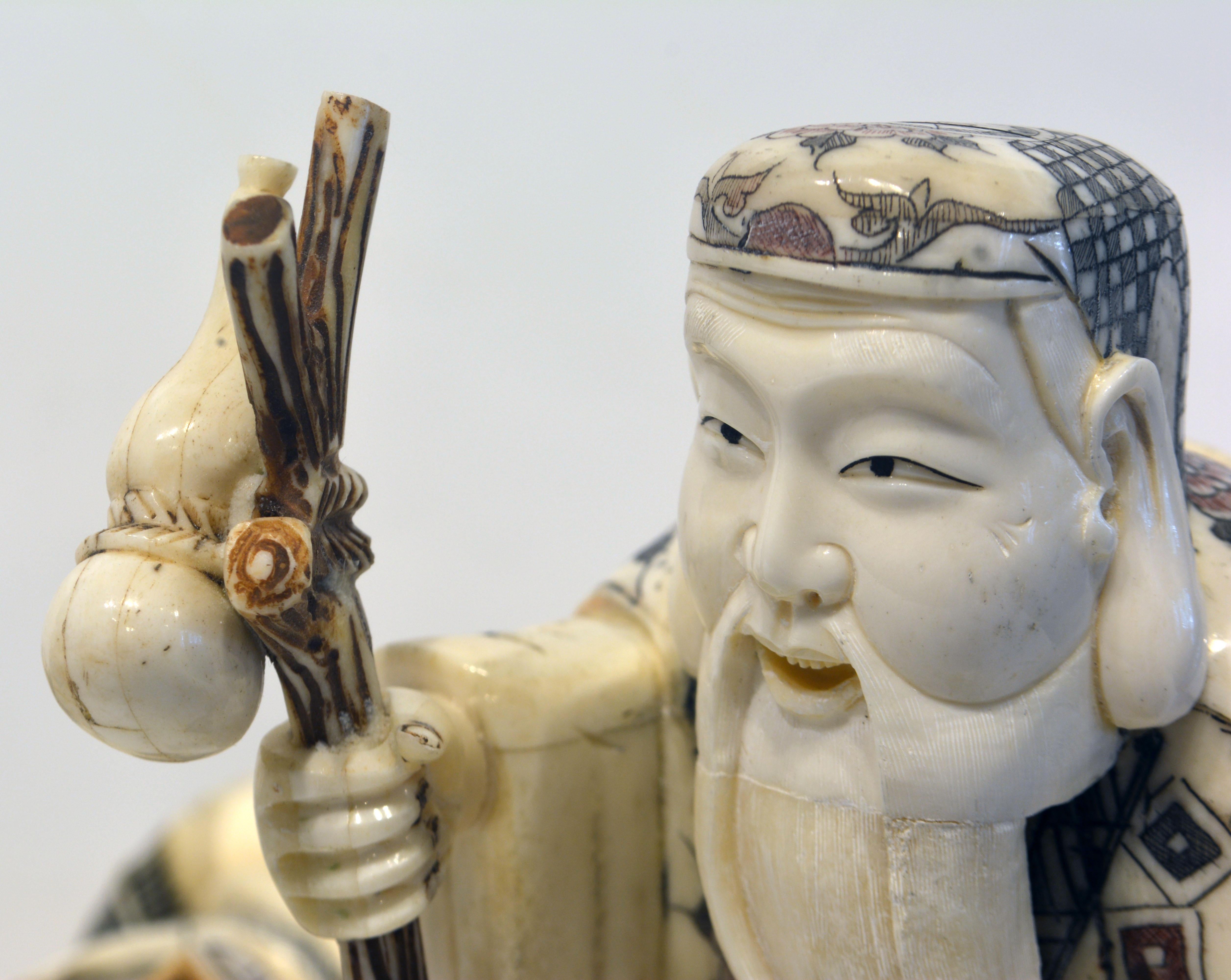 Hand-Carved Group of Four Chinese Carved Ox-Bone Scrimshaw Immortal Figures, 20th Century