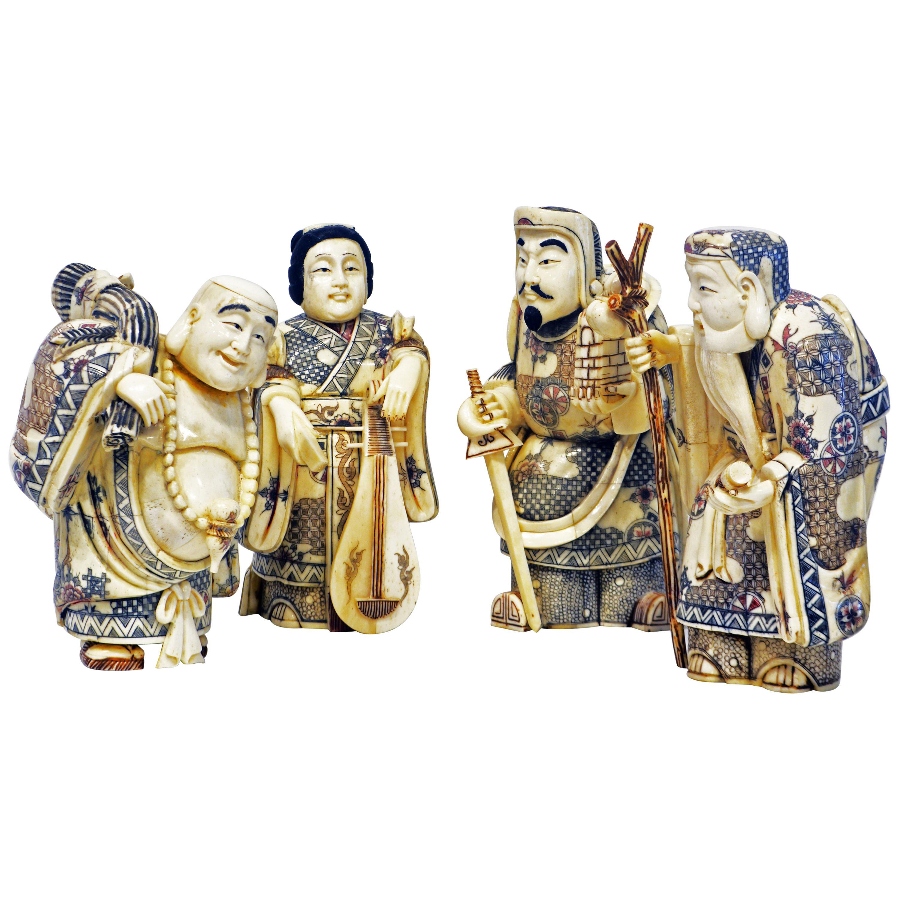 Group of Four Chinese Carved Ox-Bone Scrimshaw Immortal Figures, 20th Century