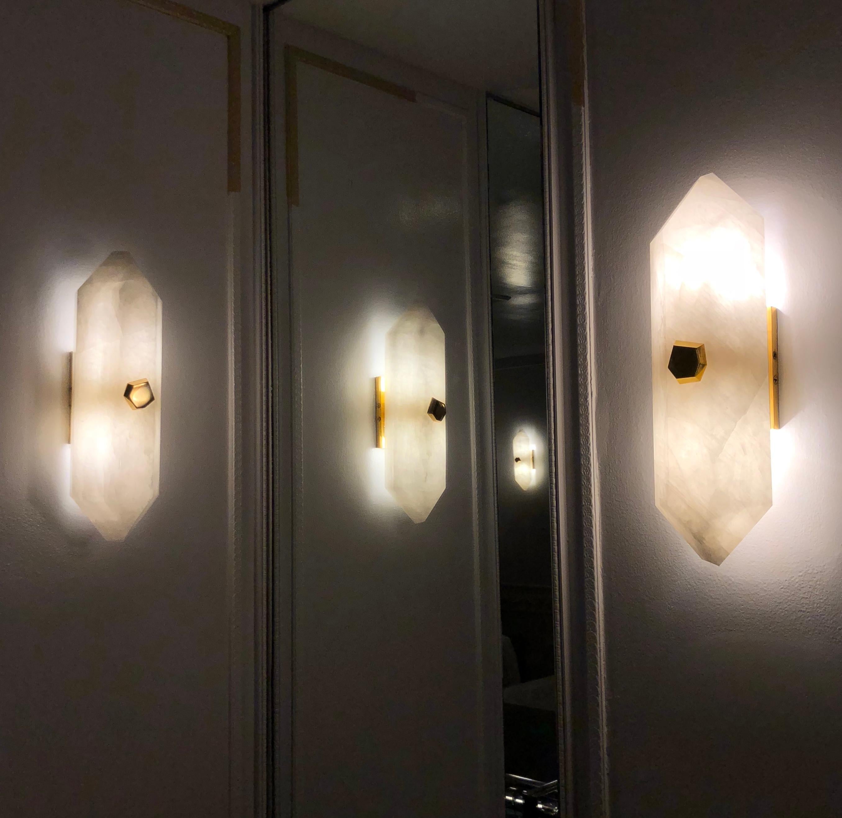 Contemporary Group of Four Diamond Form Rock Crystal Sconces by Phoenix For Sale