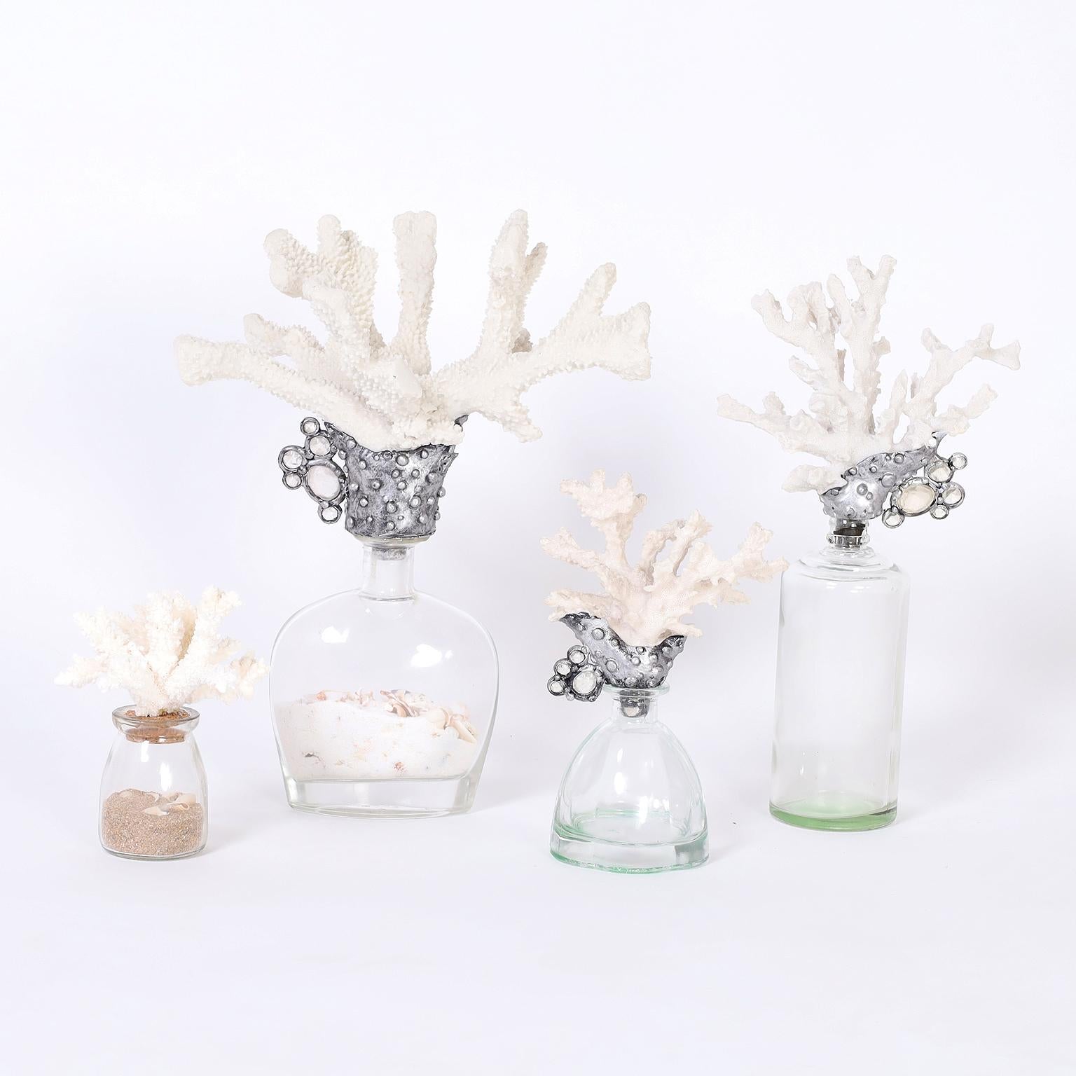 Collection of four objects of art each with its own ocean inspired composition in faux coral, metal, and glass. Priced individually. 

From left to right.

5783A: H: 6.5 W: 5 D: 4 $570

5783B: H: 15 W: 12 D: 8.5 $1250.00

5783C: H: 9.5 W: 6