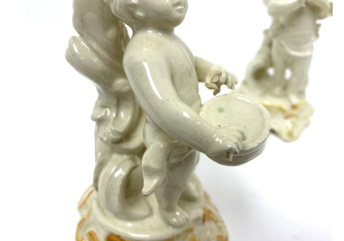 Group Of Four Italian Putti Della Robbia Style Candlesticks For Sale 7