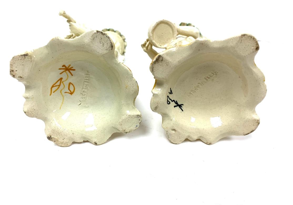 Group Of Four Italian Putti Della Robbia Style Candlesticks In Distressed Condition For Sale In Bridgeport, CT
