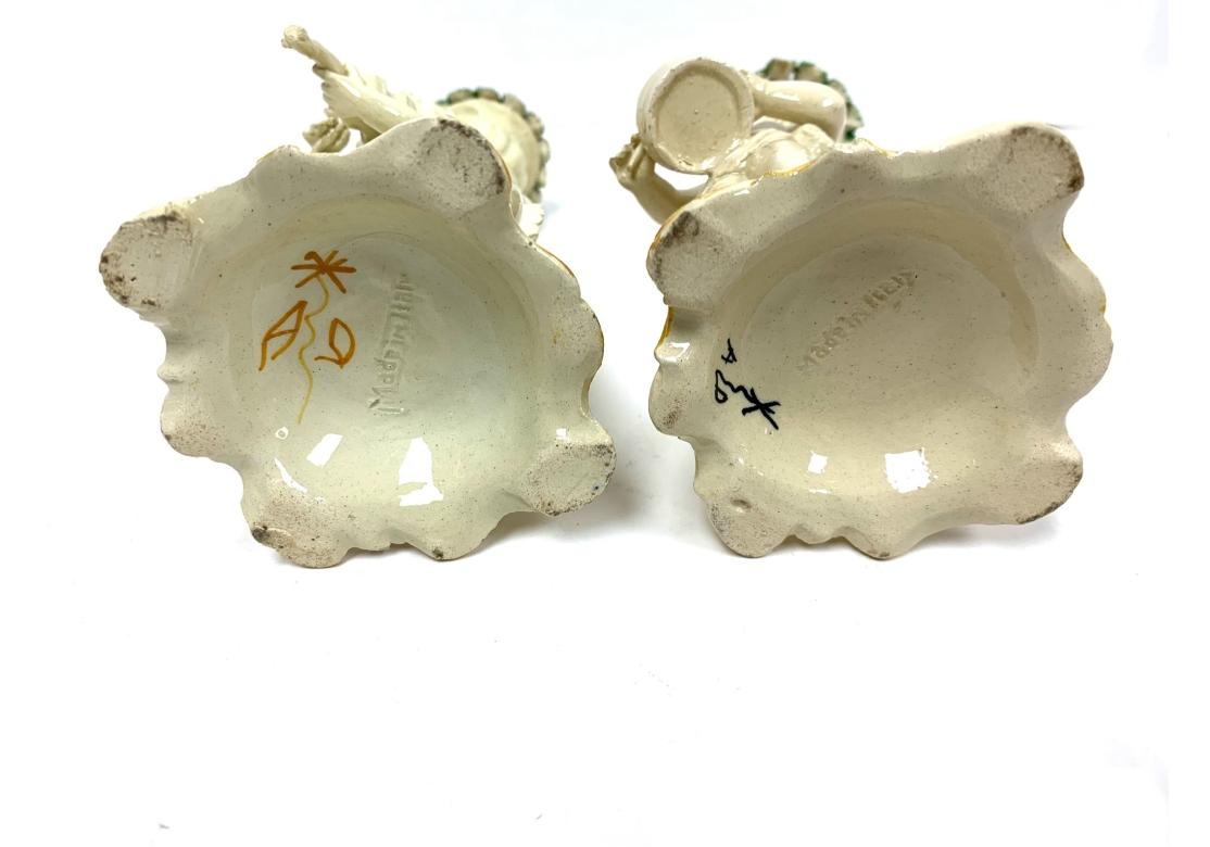 20th Century Group Of Four Italian Putti Della Robbia Style Candlesticks For Sale