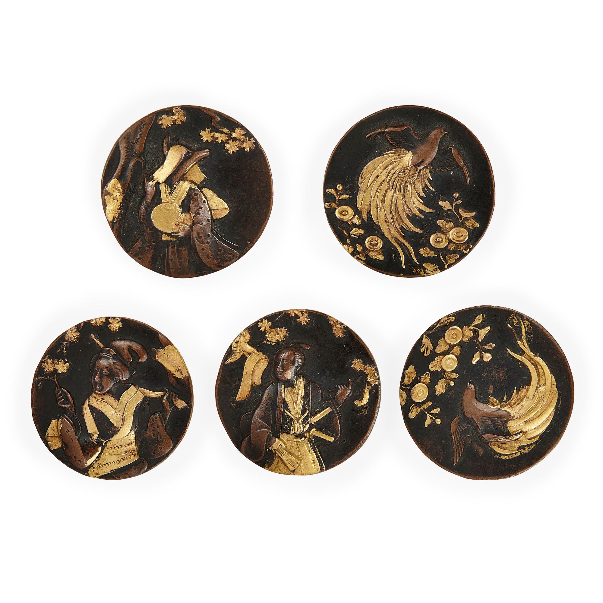 Group of fourteen Japanese Meiji period gilt metal plaques
Japanese, Late 19th Century
Height 2cm, width 2cm

These beautiful Japanese Meiji period plaques are crafted from an alloy of gold and copper that has been treated to render a black patina