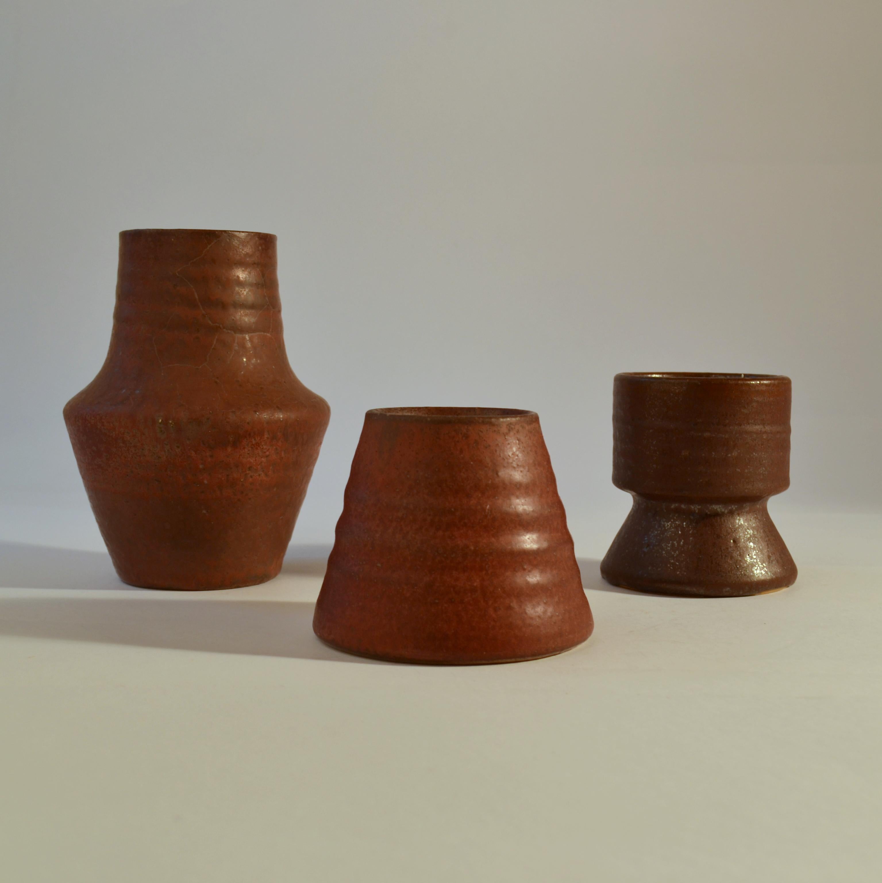 Mid-20th Century Group of Mid Century Ceramic Studio Vases Dark Red