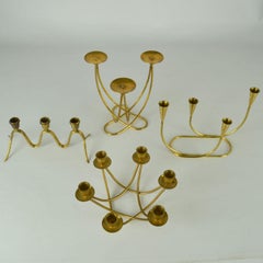 Group of Mid-Century Modern Brass Curvaceous Candelabras