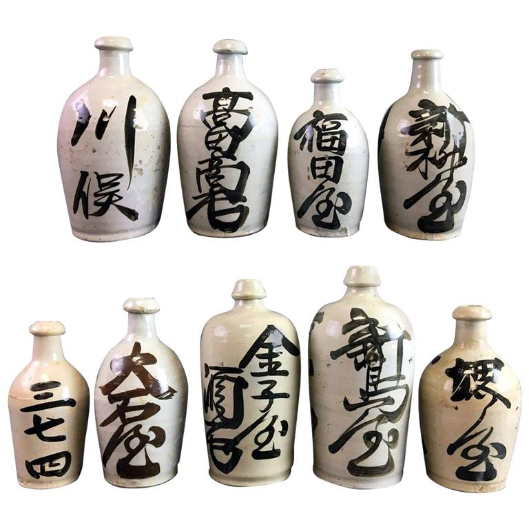 Group of Nine Vintage Japanese Sake Bottle