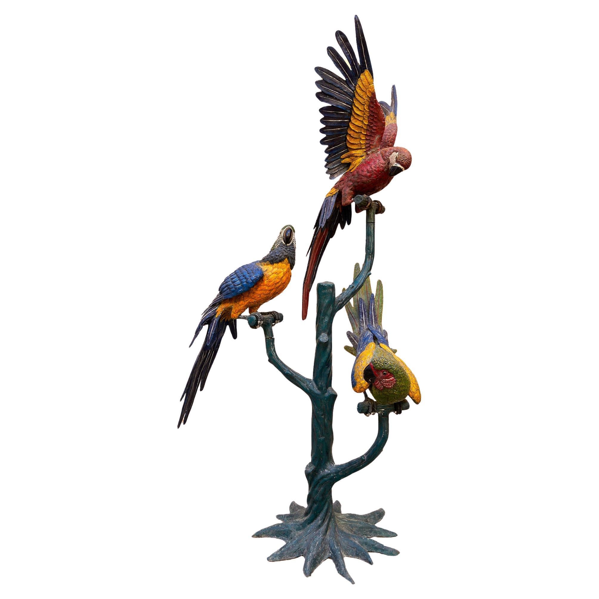 Group of parrots on a painted bronze perch, 1970. For Sale