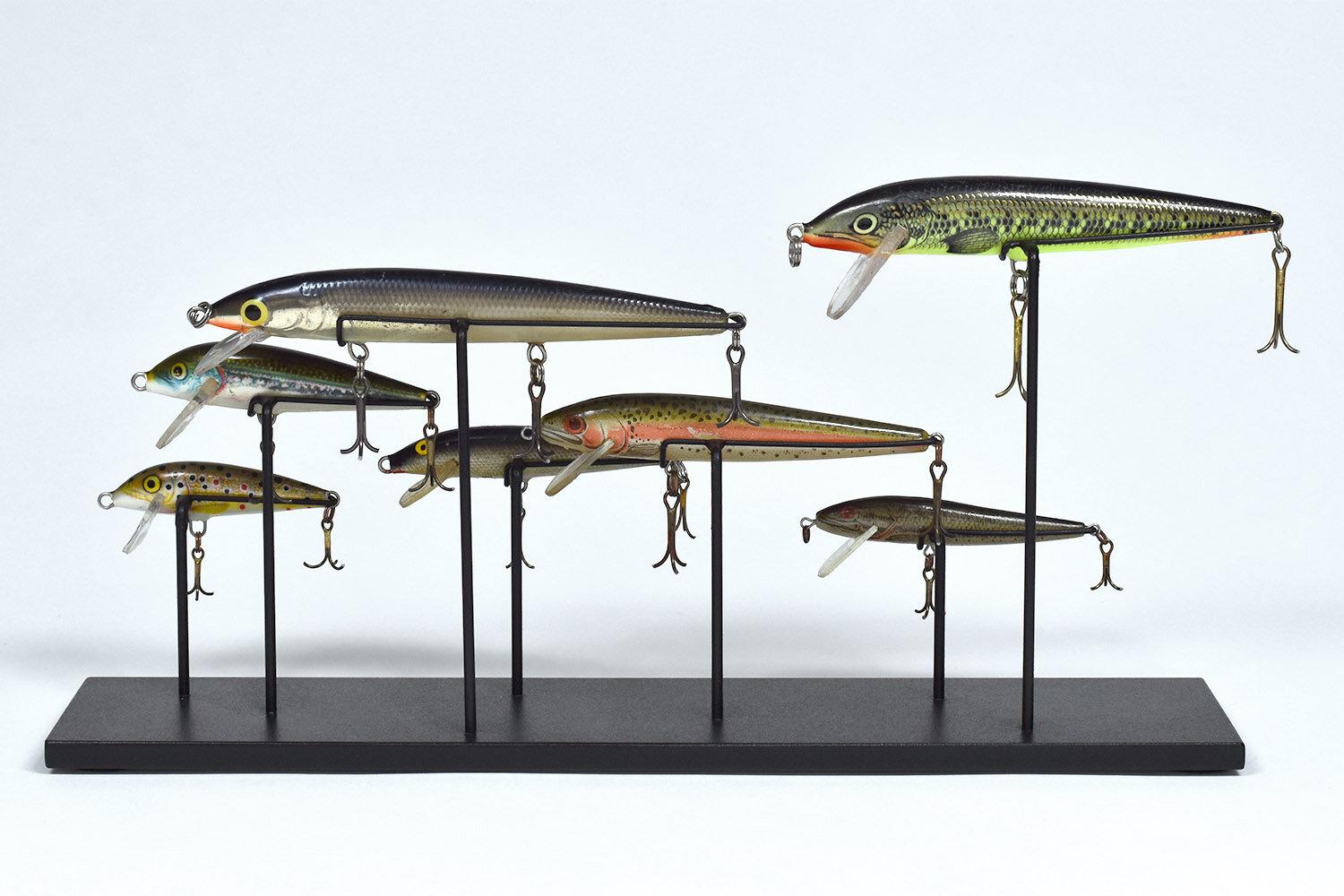 Group of seven freshwater fishing lures collected from Lake Tahoe California

Part of a large group of lures collected over several years from the bottom of Lake Tahoe by a father and son as competitive sport and summer fun. The age and condition