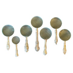 Group of Seven Sterling Handled Magnifiers  Early 20th century