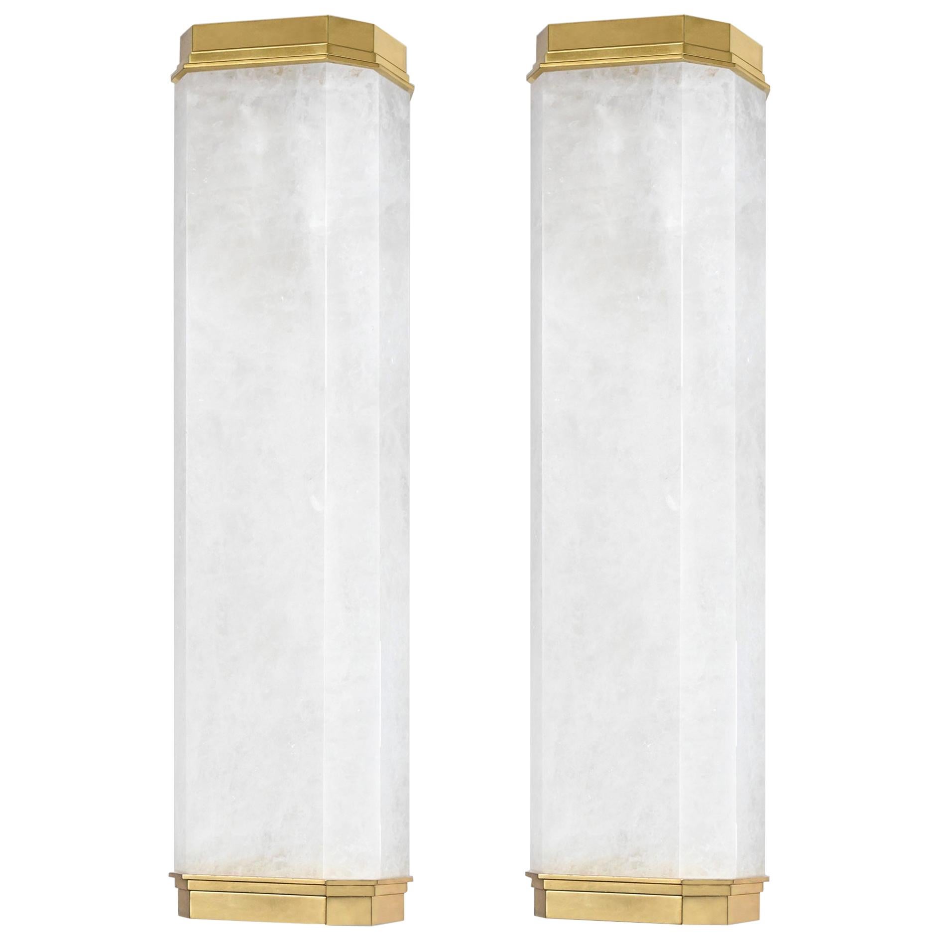 Pair of rock crystal sconces with polished brass decoration. Created by Phoenix Gallery.
Each sconce installed with two E26 sockets. Use two 80 watts long tube LED warm light lightbulbs. 160w total.
 