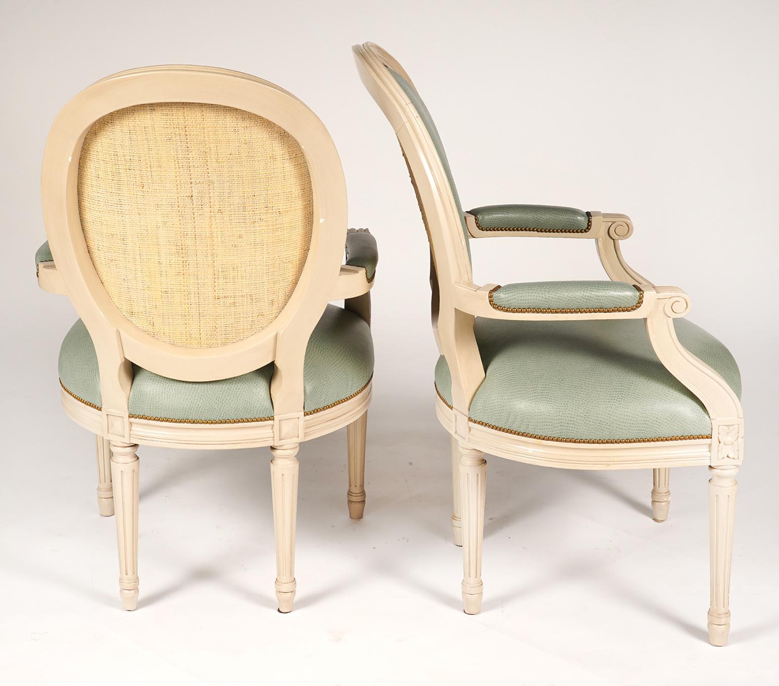 20th Century Group of Six Louis XVI Style Painted and upholstered Oval Back Armchairs, 20th C