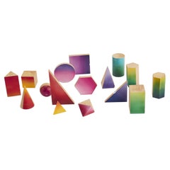 Group of small wooden geometric models with chromatic faces, Italy 1900.