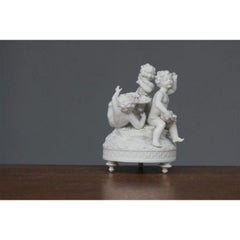 Group of Three Cherubs Around a Biscuit Basket, 1900 Period