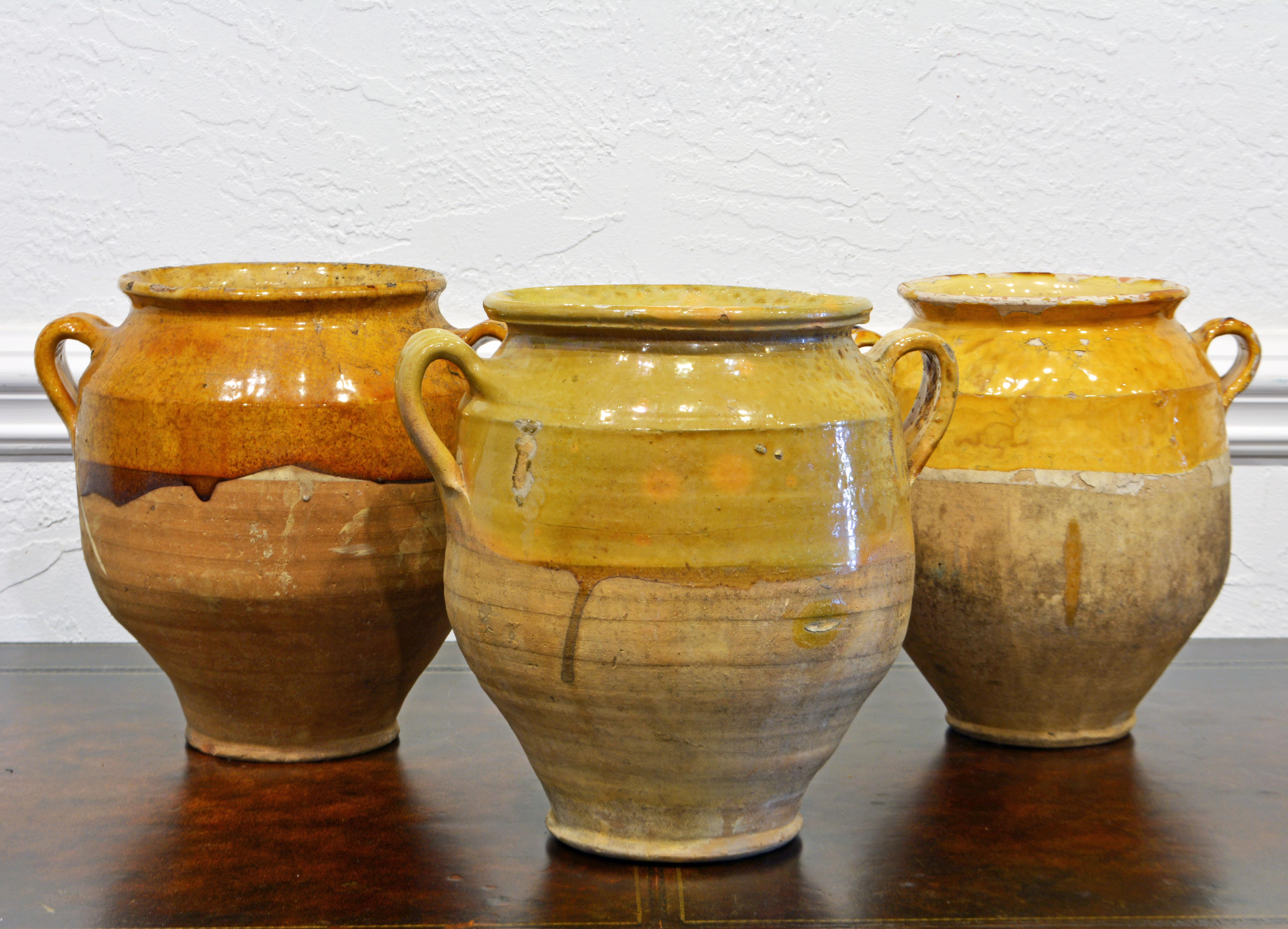 French Provincial Group of Three Large 19th and Early 20th Century French Terracotta Confit Pots