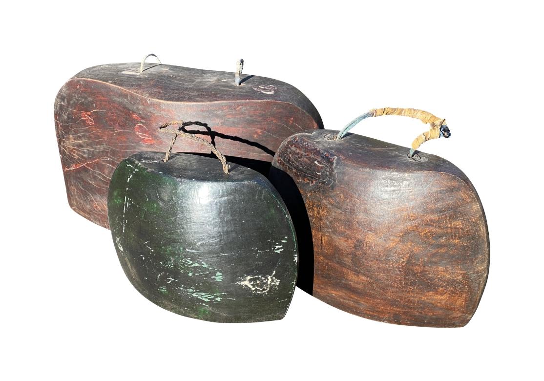 Tribal Group Of Three Massive Wood Temple Bells For Sale
