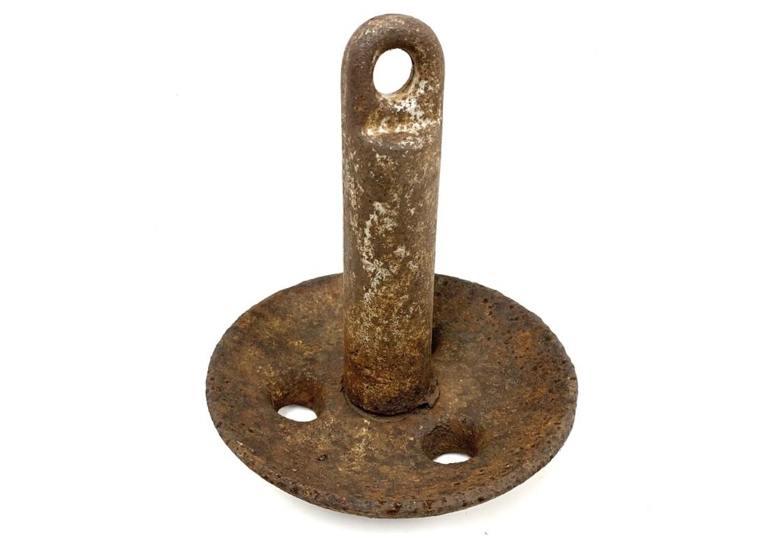 Three Vintage cast metal Mushroom Anchors with elemental form once used to secure smaller boats and useful for Pond, Lake or Marsh environments . Two are cast iron and one is cast aluminum and they all exhibit fine age patina sand evidence of use
