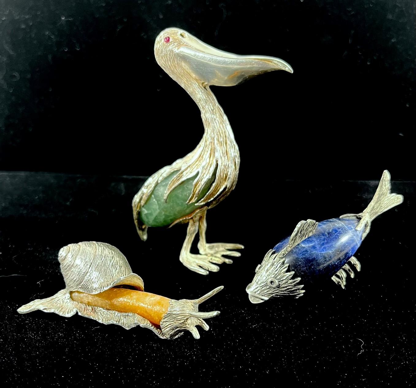 Group of Three Rare Miniature Animals in Sterling Silver and Semi-Precious Stones.

These rare miniature figurines convey a high level of quality and art value. The splendid work in Sterling silver is handmade by a skilled silversmith in South