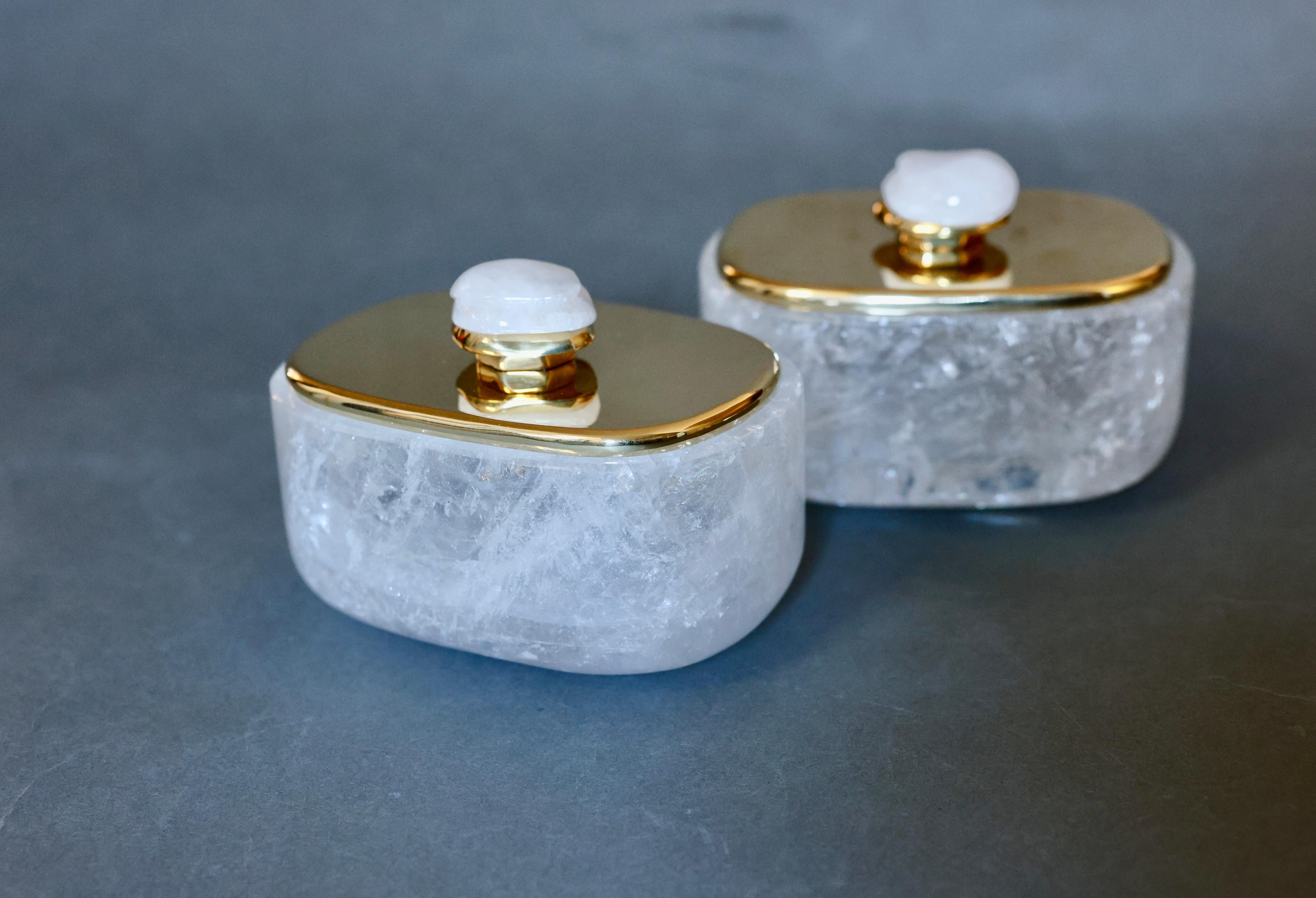 Group of three finely carved rock crystal boxes with polish brass covers,
Measures: 7” x 5” x 5”/ H 
8”x 6” x 5.25”/ H
8.75” x7”x 5.5”/ H.

