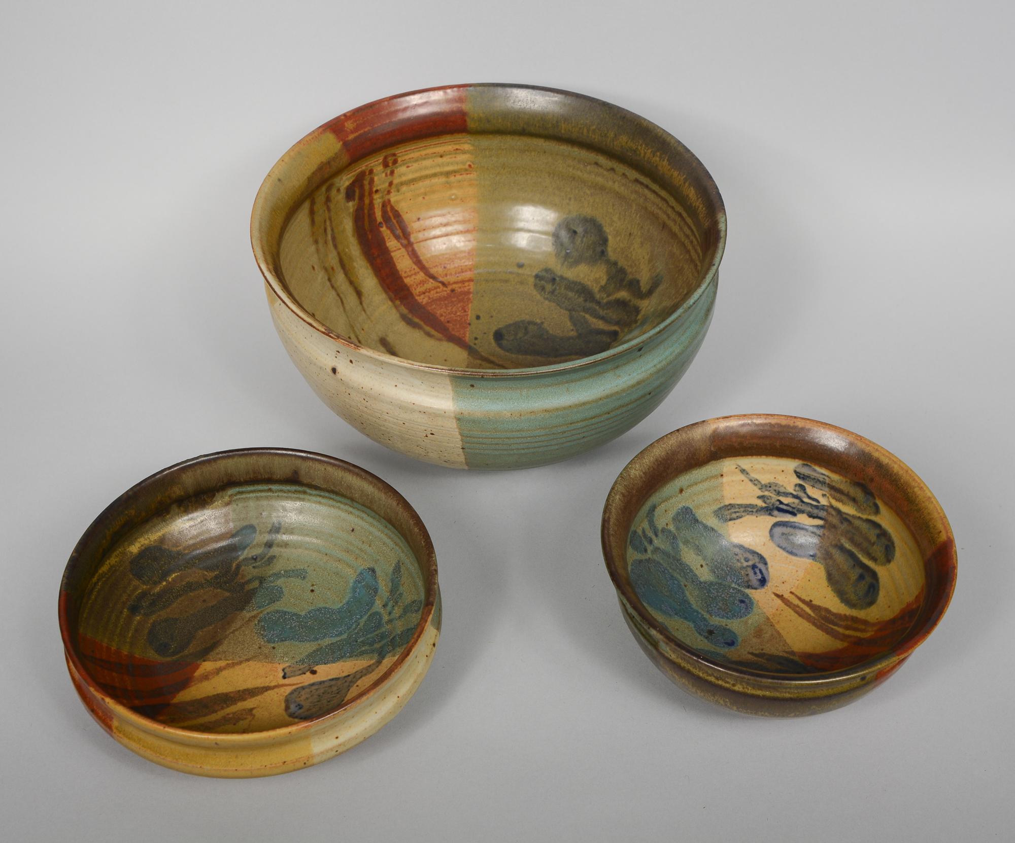 Three bowls by studio potter William 