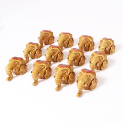 Group of Twelve Elephant Head Wall Ornaments, Priced Per Set of Four