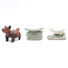 Group of Two Celadon Headrests and One Pre-Columbian Dog Effigy
