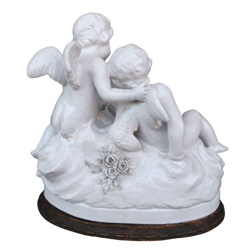 Group of Two Cherubs Around a Late 19th Century Porcelain Basket For Sale 2