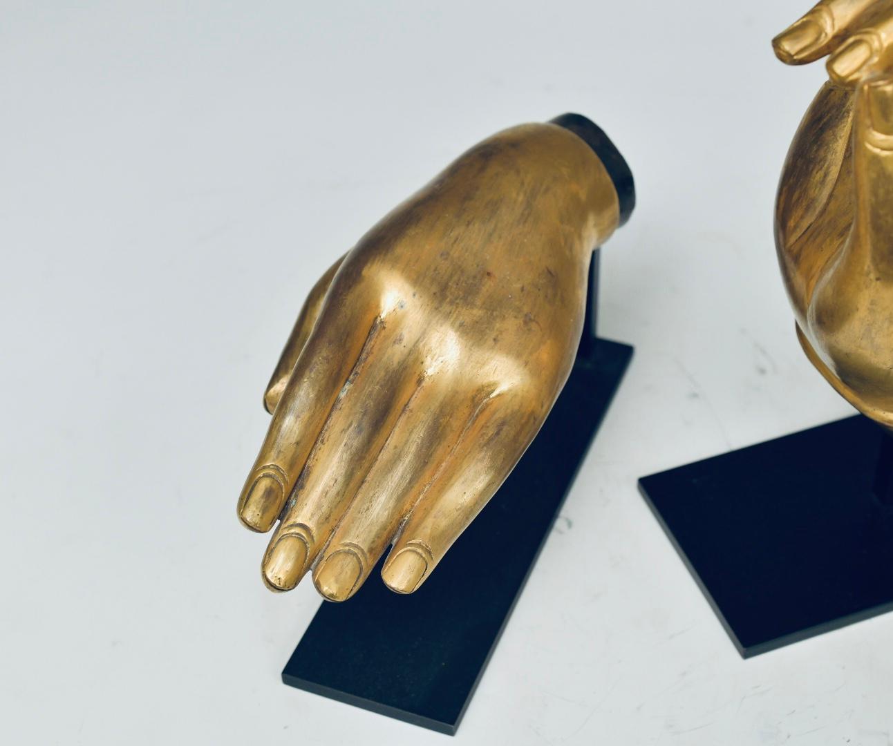 Fine cast gilt bronze Buddha hands from Tibet, left hand in giving mudra and right hand in teaching mudra.
Left hand dimension: 9/L x 5/H x 4/D
Right hand dimension: 4/L x 11.5/H x 5/D.