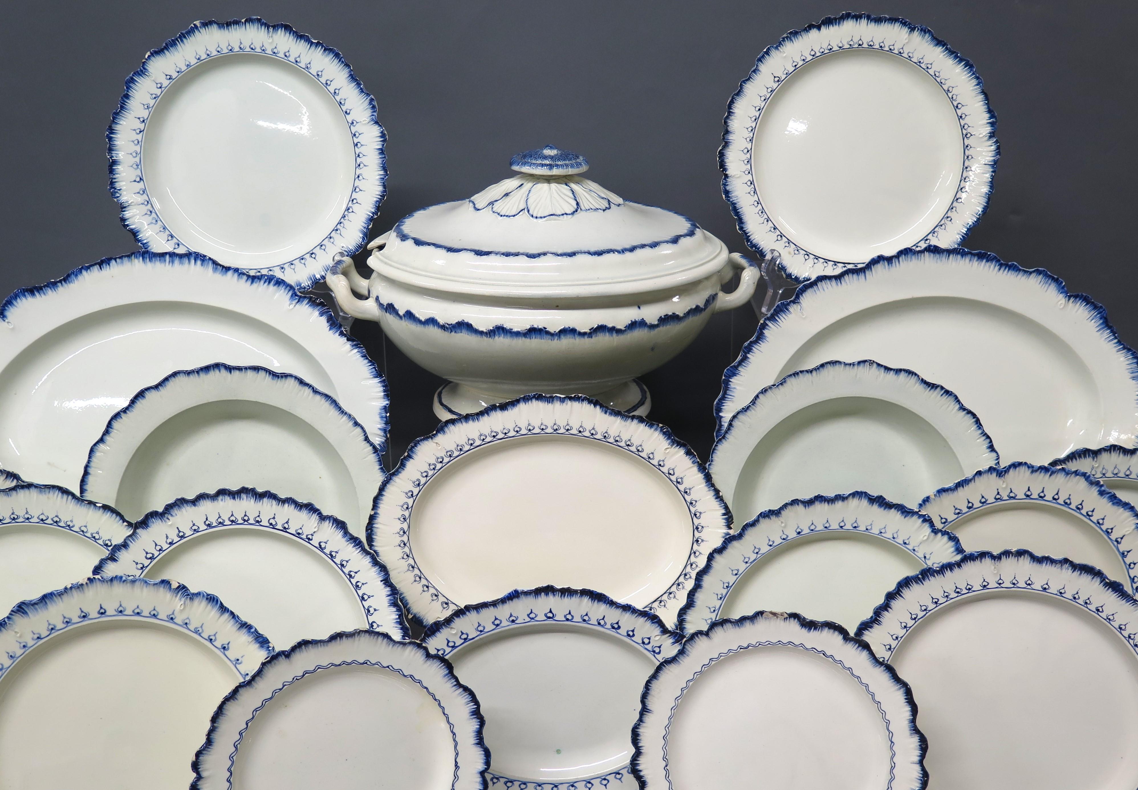 a handsome 25 piece group of feather edge creamware / pearlware with impressed Wedgwood mark, group includes a tureen with lid, several oval platters, and several sizes of plates. England, late 18th / 19th century

MEASUREMENTS:

9.75