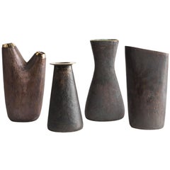 Grouping of Four Carl Auböck Brass Vases
