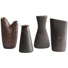 Grouping of Four Carl Auböck Brass Vases