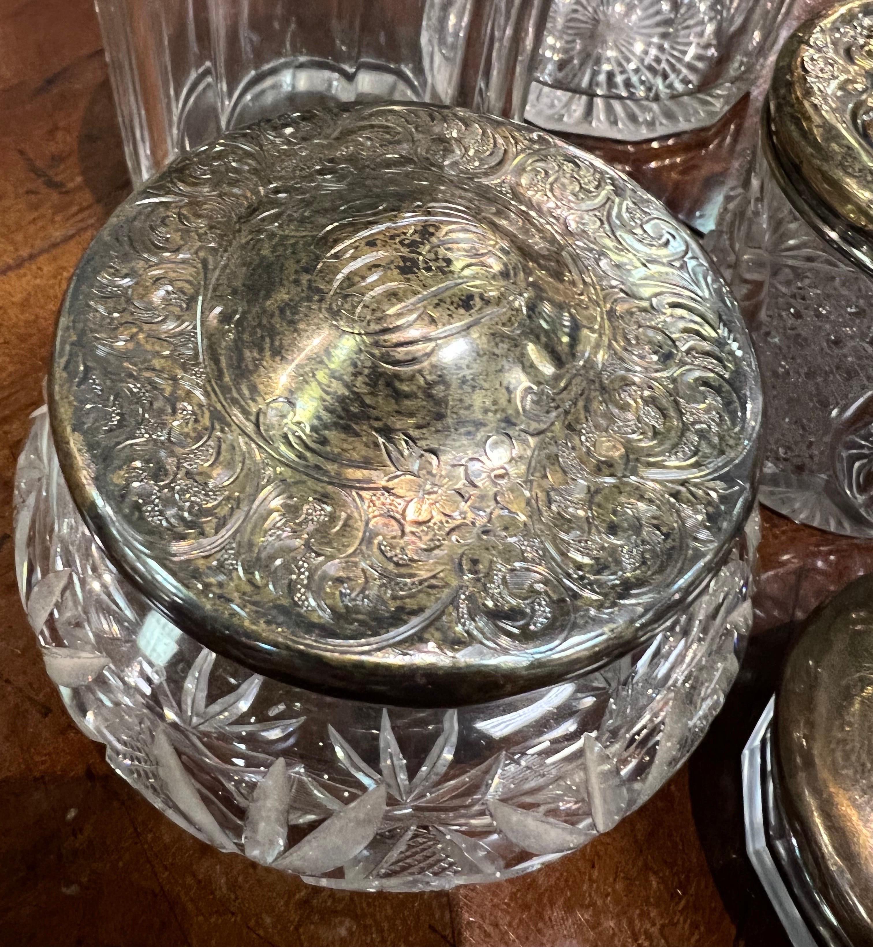 antique glass jar with silver lid