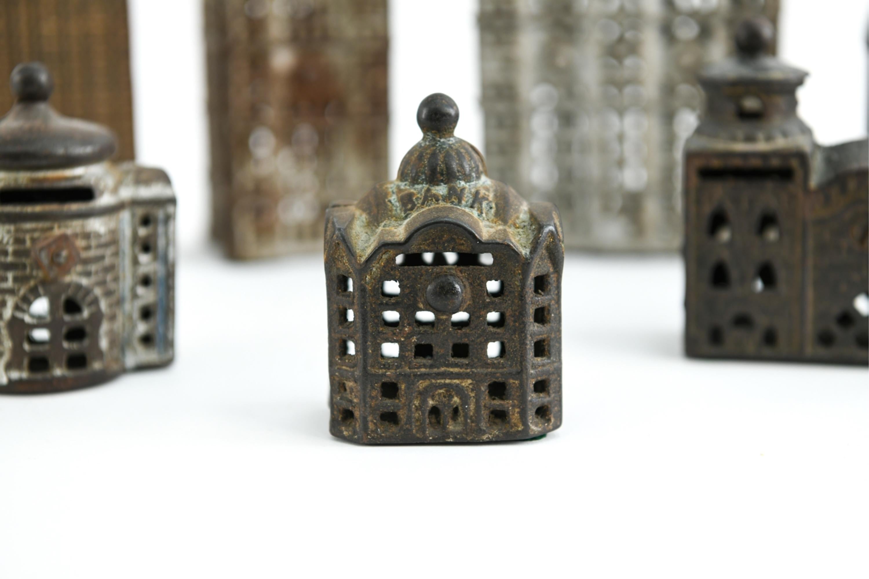 20th Century Grouping of Cast Iron Miniature Buildings For Sale