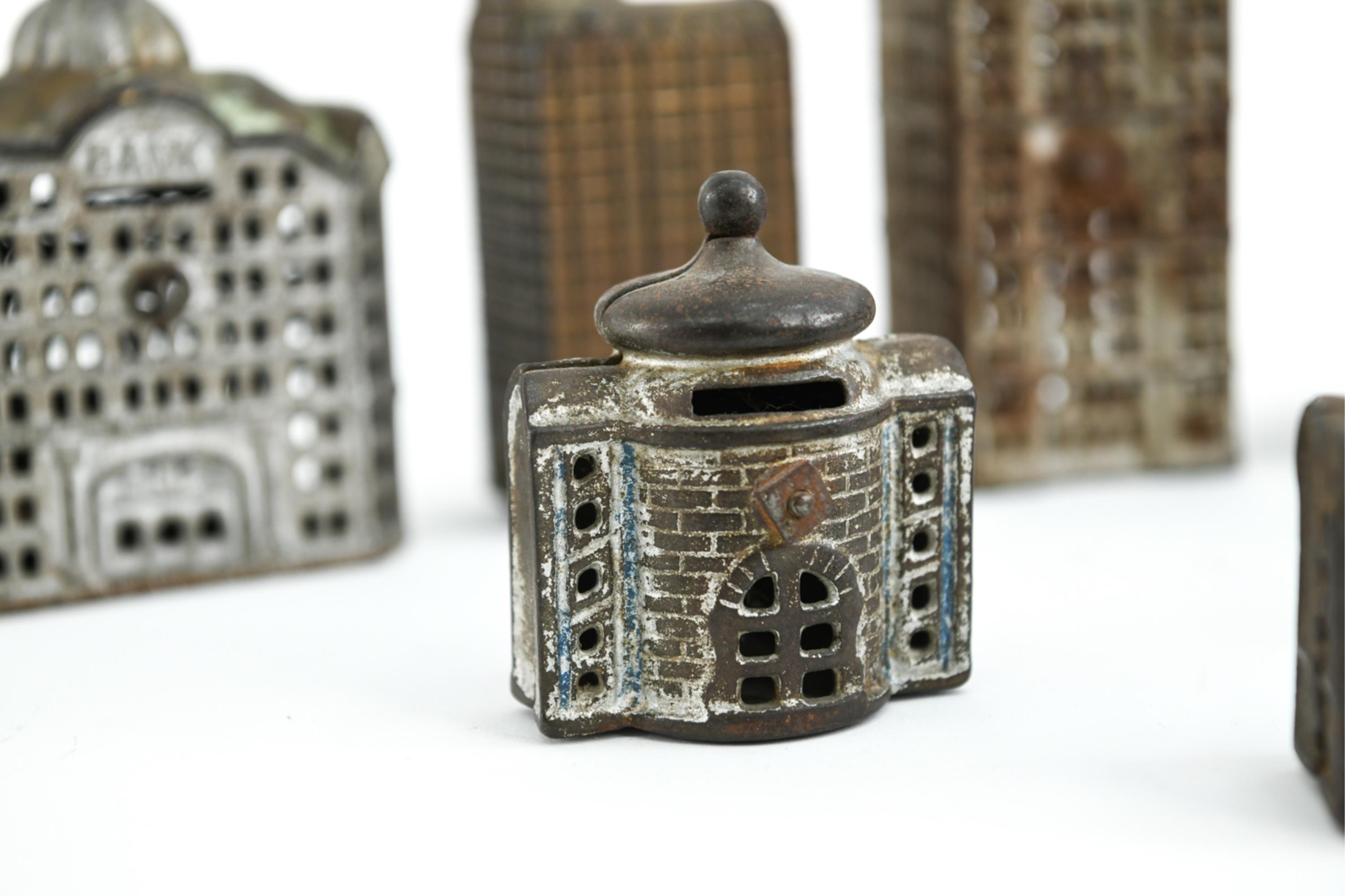 Grouping of Cast Iron Miniature Buildings For Sale 1