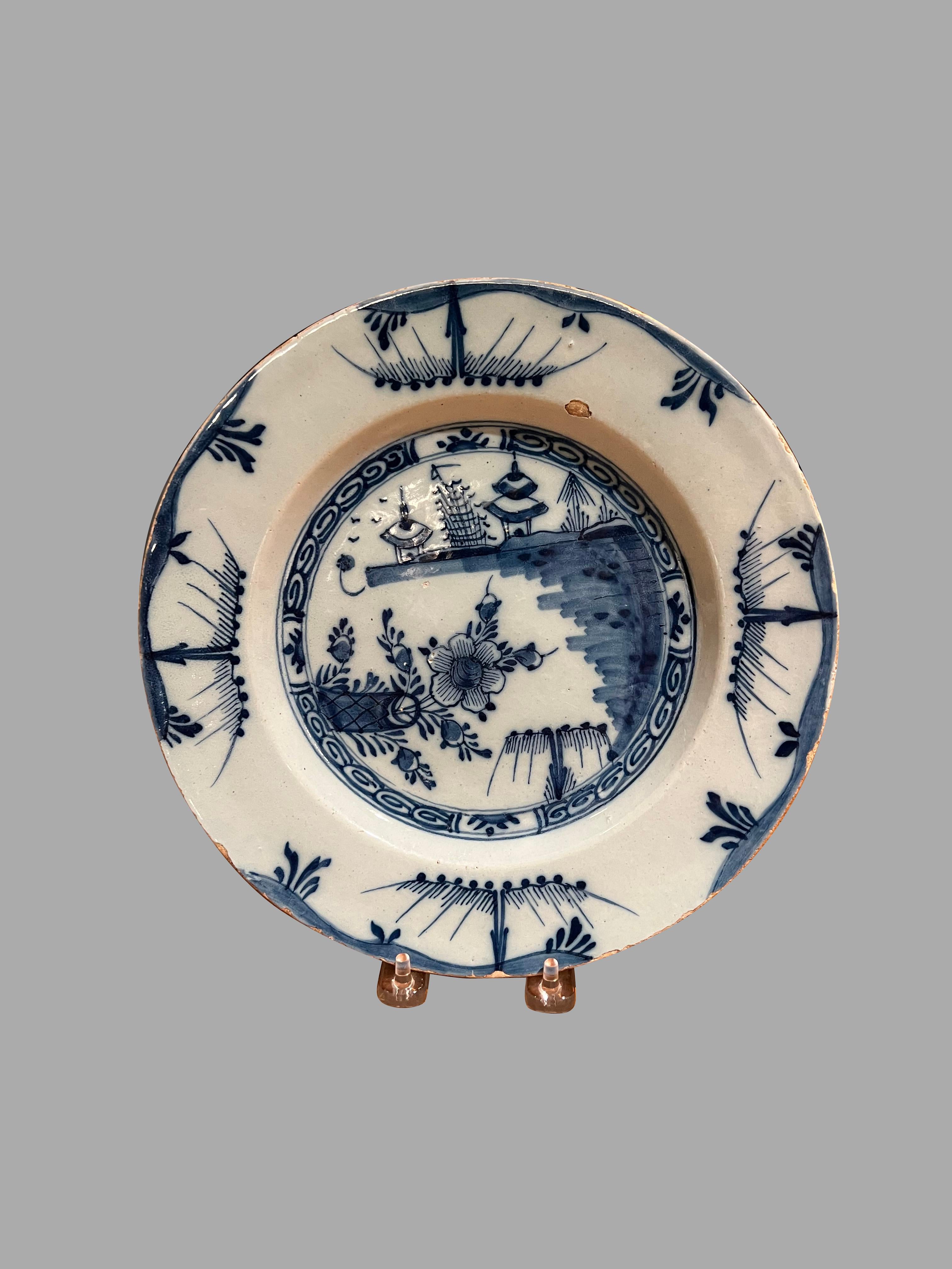 Grouping of Three Delft Blue and White Plates A Pair and a Single In Good Condition For Sale In San Francisco, CA