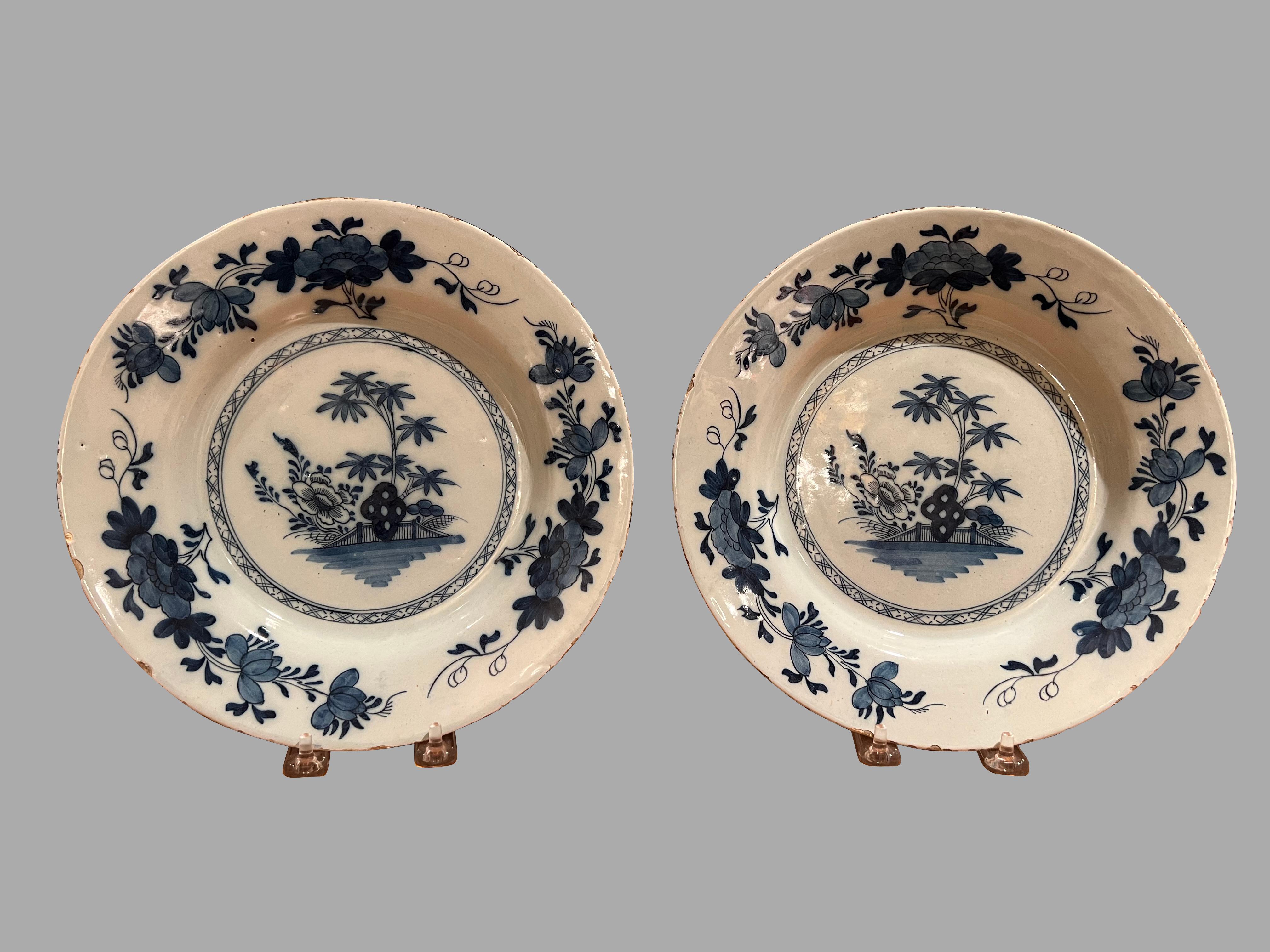 Earthenware Grouping of Three Delft Blue and White Plates A Pair and a Single For Sale