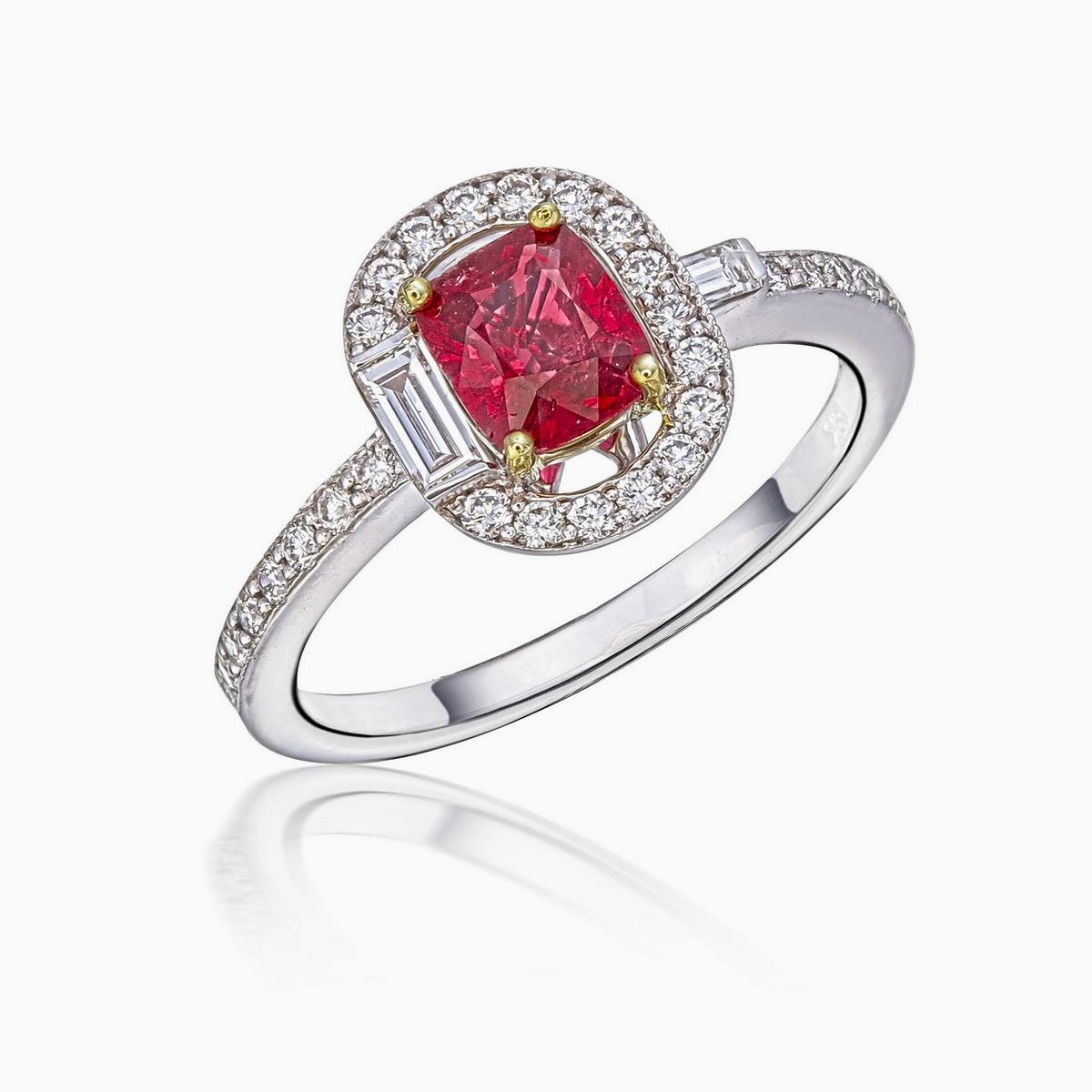 A ‘Pigeon Blood’ red hue ruby and diamond solitare ring made in 18 Karat gold. This ring was inspired by art-decor themes portrayed through the use and placement of baguette-cut diamonds. A good choice for everyday wear or for special occasions. 

 