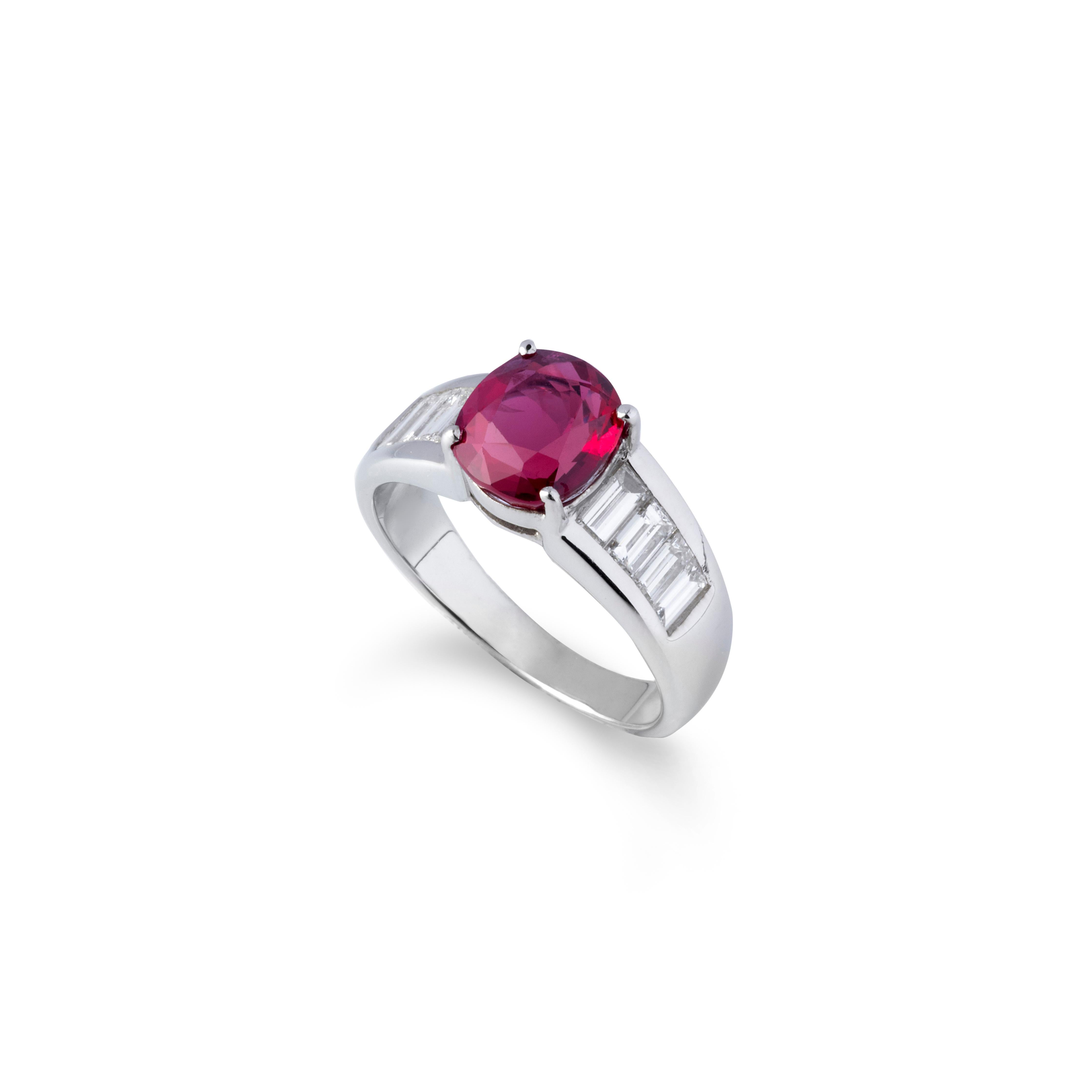 This beautiful 18K white gold fine ruby and diamond ring is special! The piece is accompanied by GRS report of the wonderful and rare 3.21 carat genuine Siam (Thailand) ruby with minimal heat treatment. The color is a typical red seen in many Siam