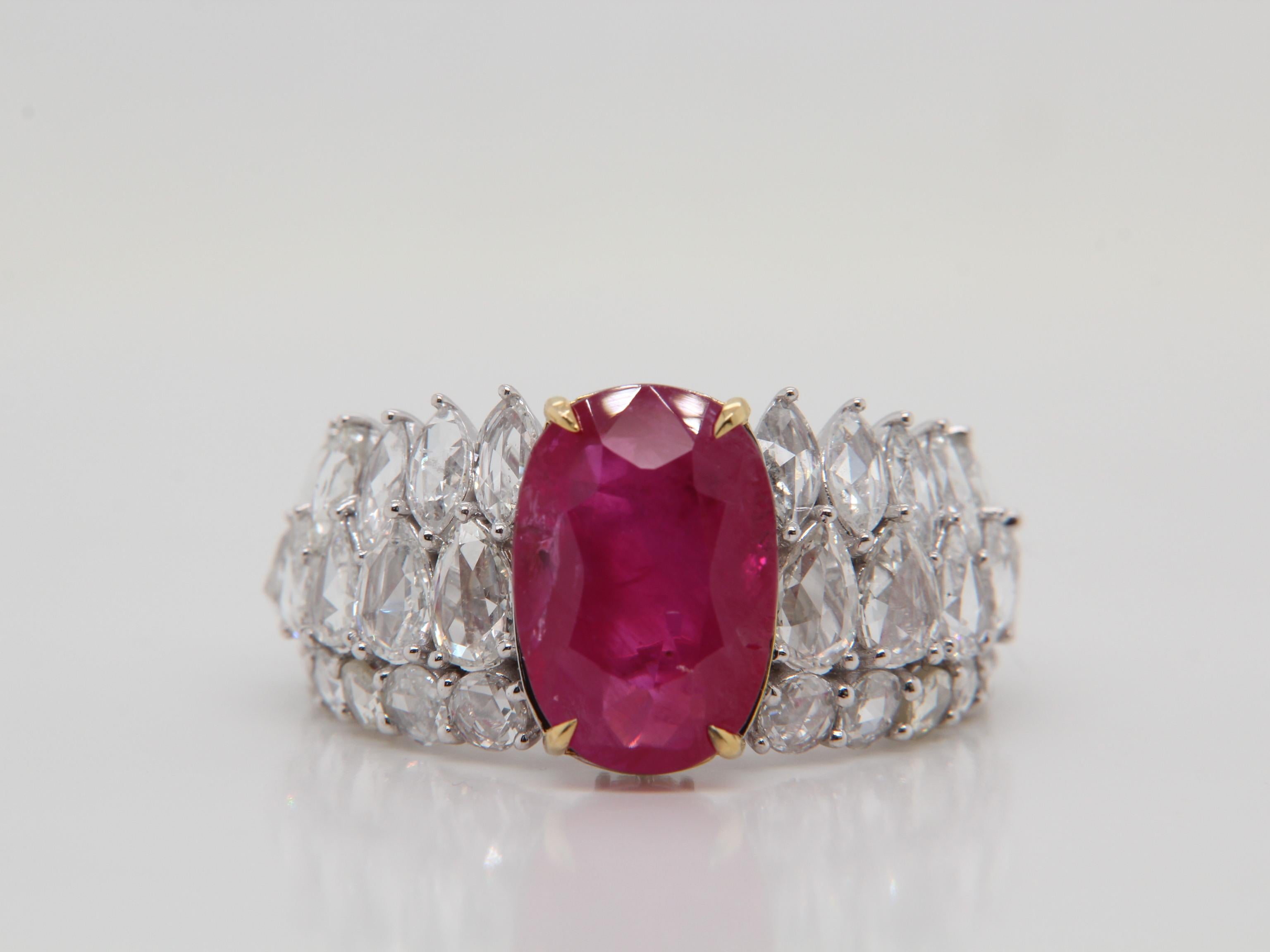 A brand new handcrafted ruby ring by Rewa Jewels. The ring's center stone is 5.07 carat Burmese ruby certified by Gem Research Swisslab (GRS) as natural, unheated, 'Red' with the certificate number 2020-071618. The centre ruby has been set with four