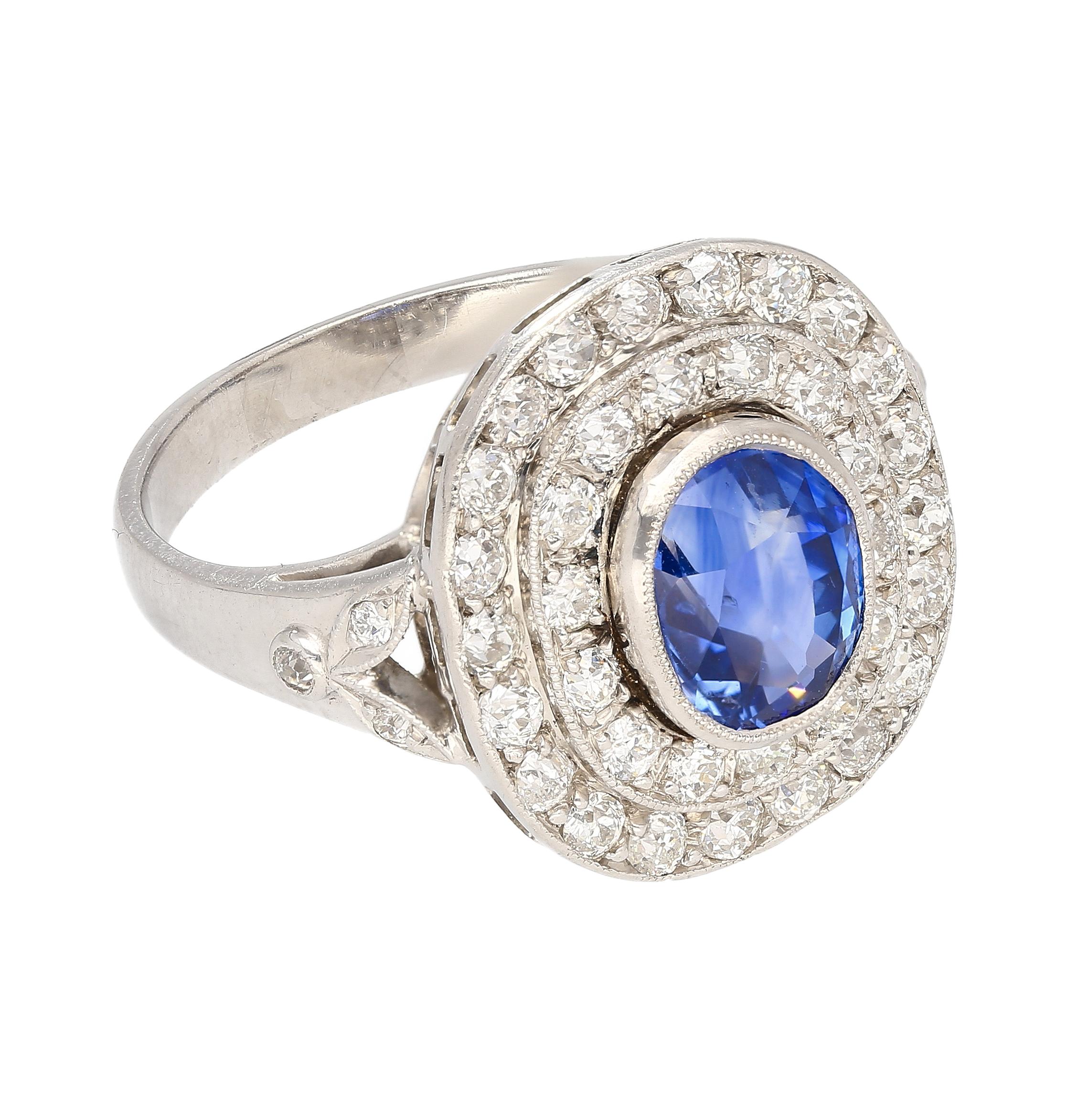 Oval Cut GRS Cert 2.56ct No Heat Kashmir Blue Sapphire in Platinum Diamond Halo Ring For Sale