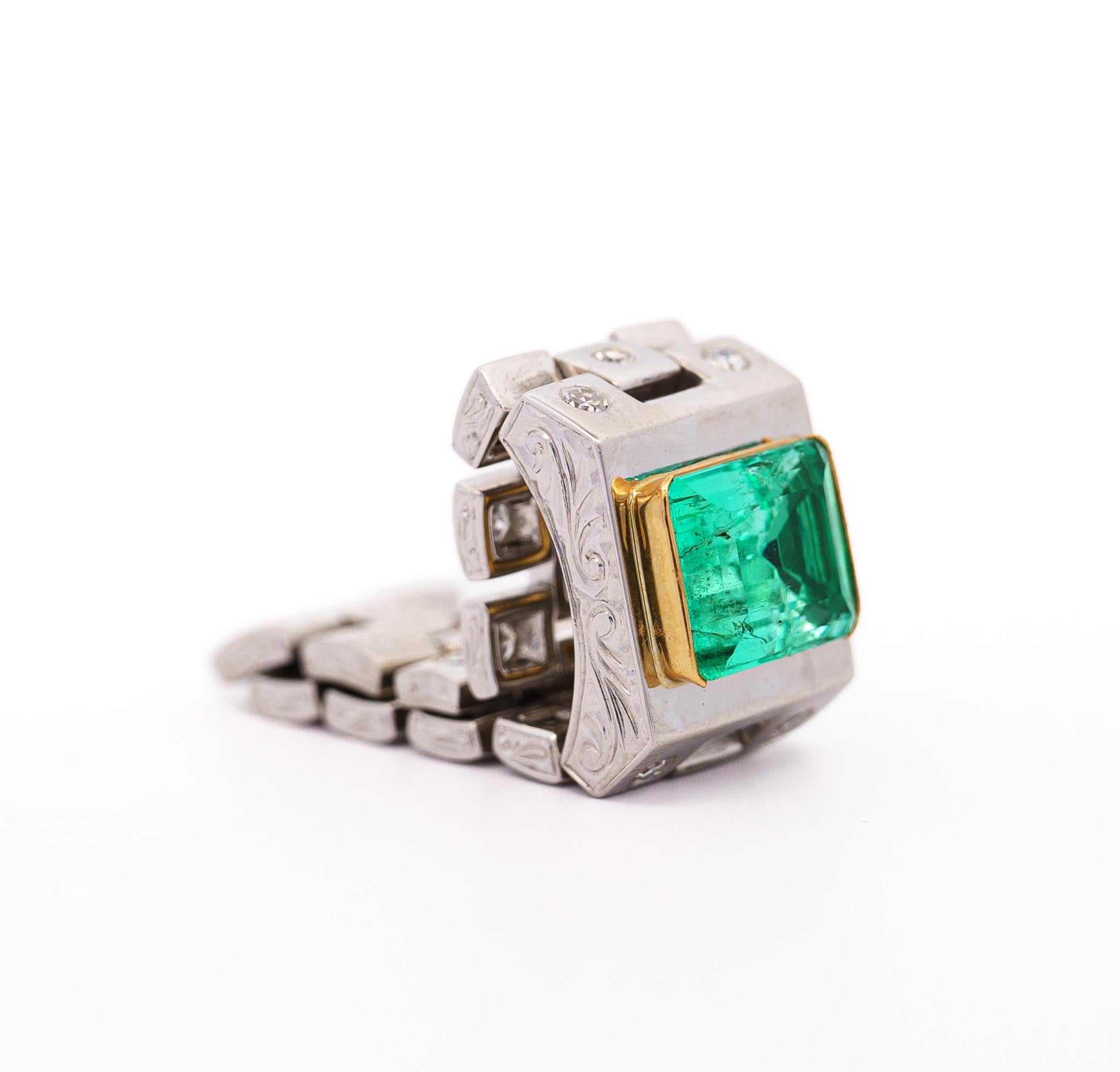 GRS certified natural Colombian Emerald mounted in an 18k gold and platinum link ring setting. This legendary Emerald is of Colombian origin and has insignificant oil treatment. The Emerald has excellent brilliance, color, and luster. It was mined