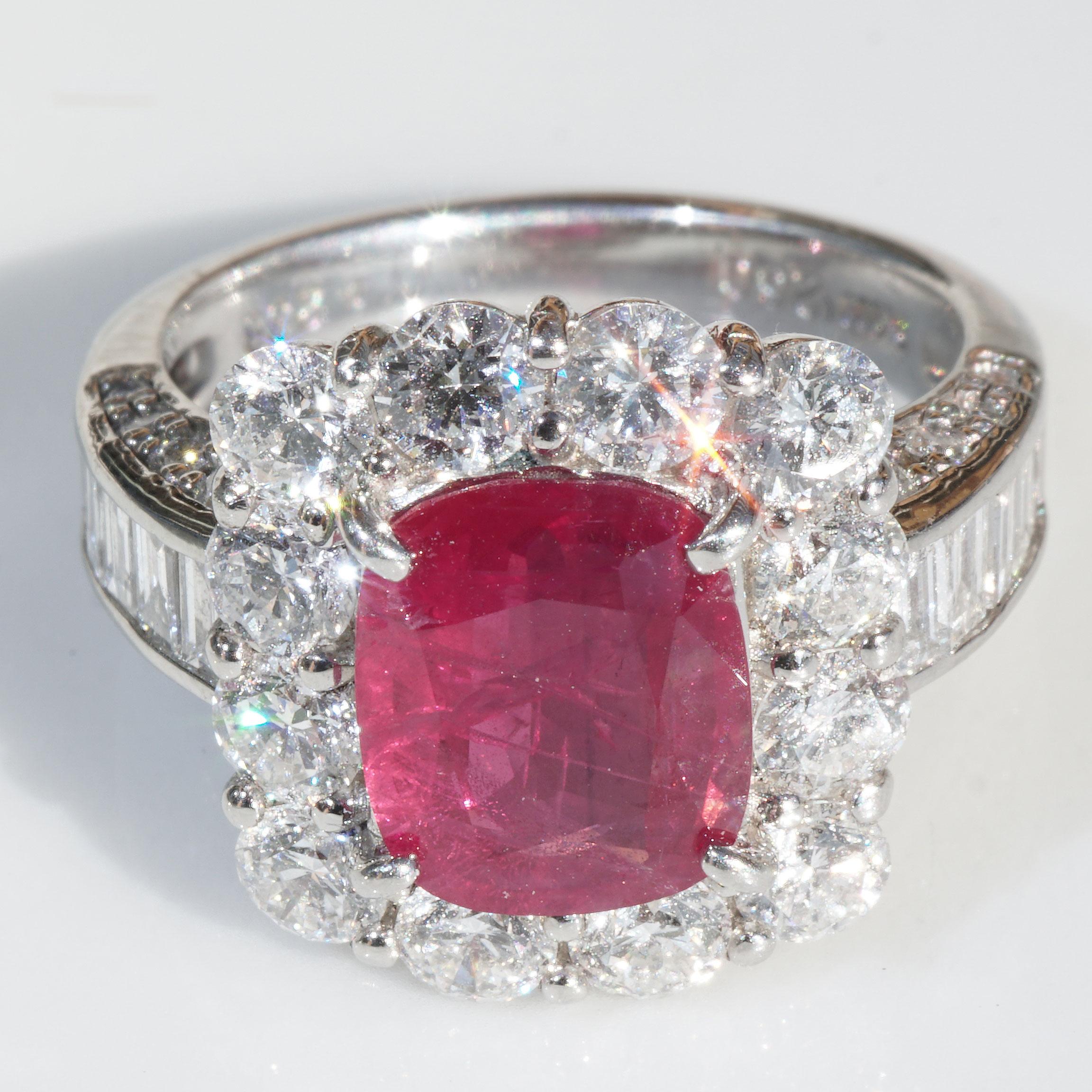an investment ring of the super class...., an unheated Burma ruby from Myanmar, color red, in cushion shape, 9.32 x 7.71 x 3.51 mm, color distribution and brilliance very good, fine fan-like liquid inclusions (well visible in magnification), in the