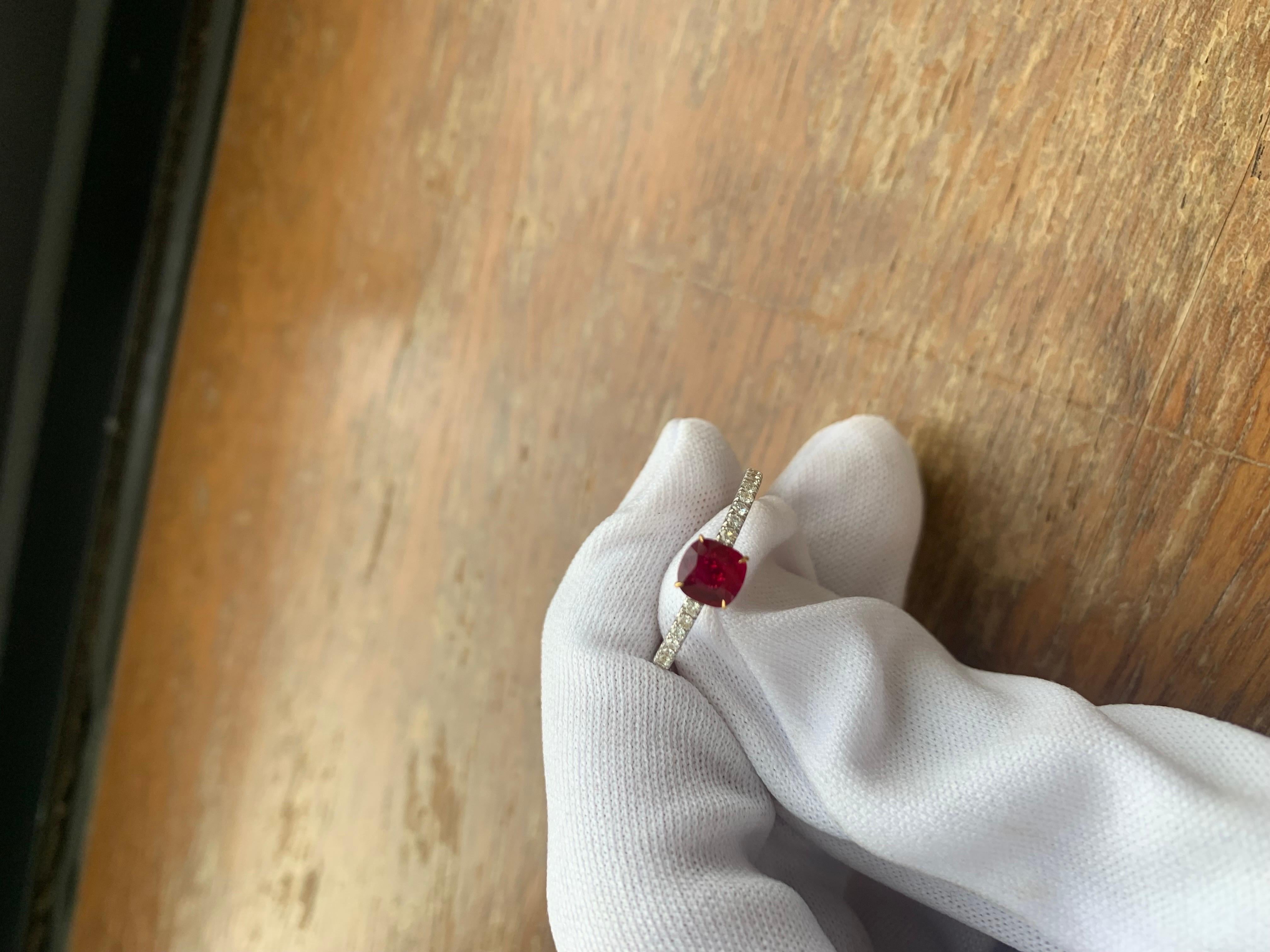 A brand new handcrafted ruby ring by Rewa Jewels. The ring's center stone is 0.73 carat Burmese ruby certified by Gem Research Swisslab (GRS) as natural, unheated, 'Pigeon blood' with the certificate number: 2021-120759. The piece has been set with