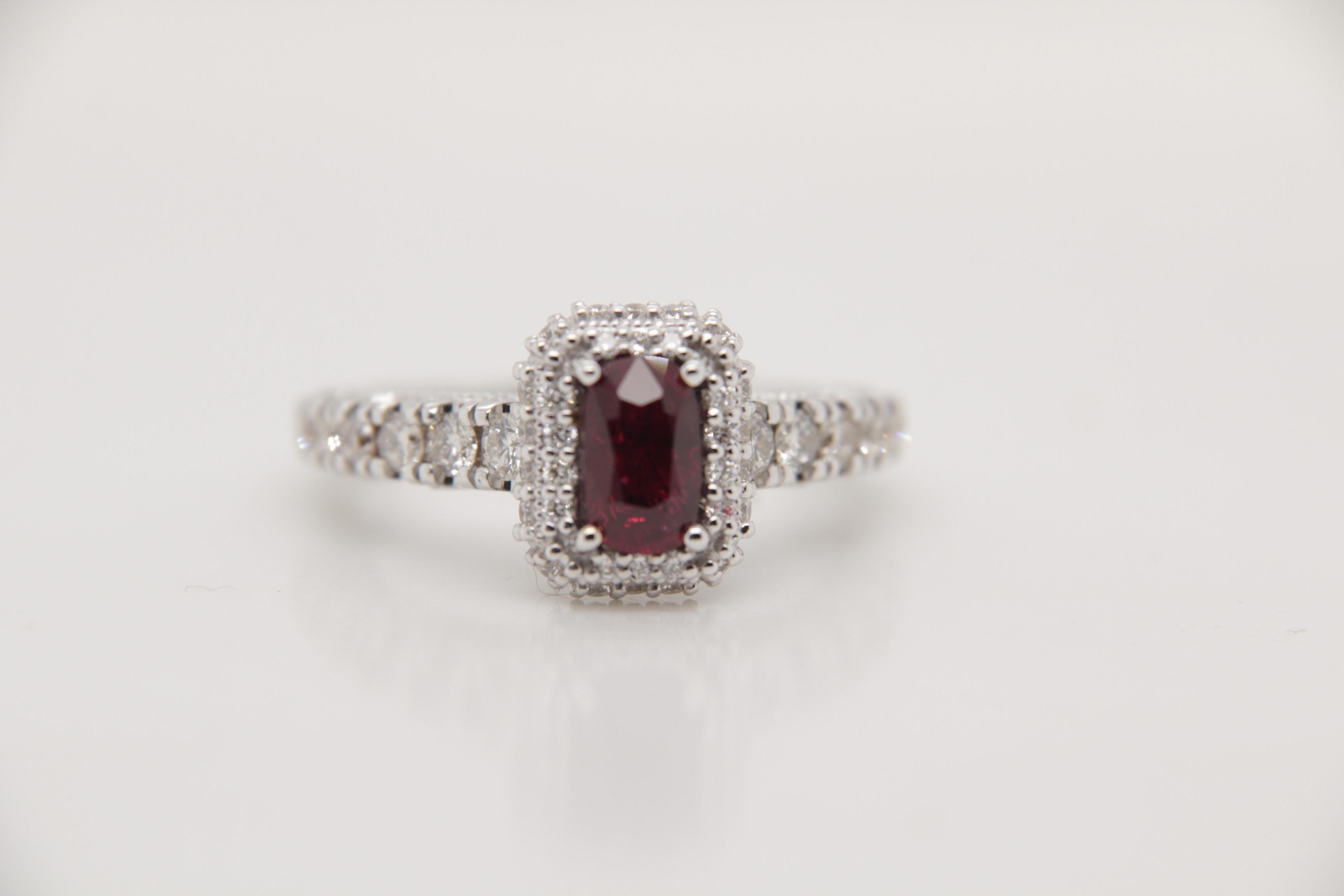 A brand new handcrafted ruby ring by Rewa Jewels. The ring's center stone is 0.75 carat Burmese ruby certified by Gem Research Swisslab (GRS) as natural, unheated, 'Pigeon blood' with the certificate number: 2021-111292. The centre ruby has been set