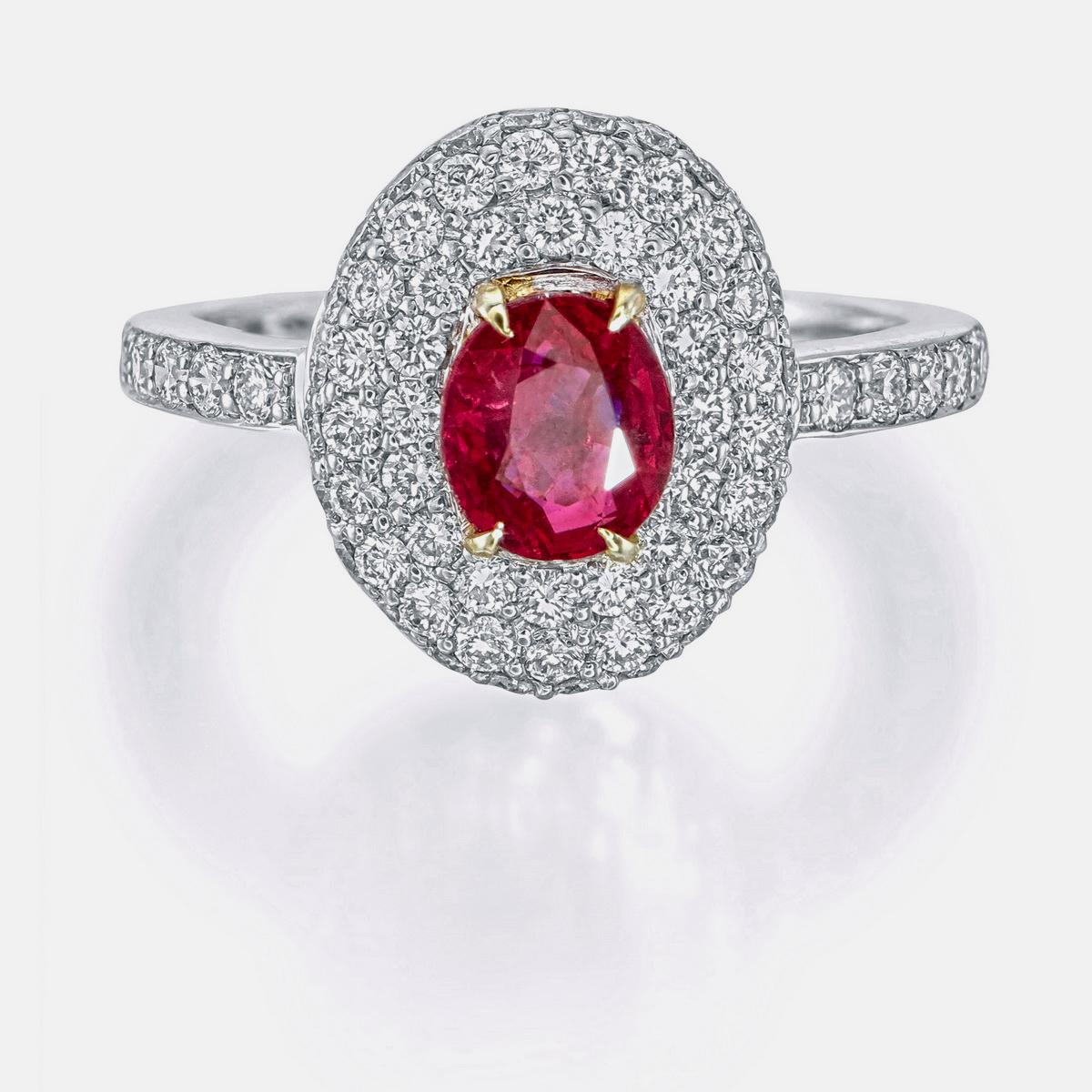 Introducing a piece from Rewa Jewelry, this Ruby and Diamond Ring is a blend of luxury and sophistication. At the center of the ring is a 1.01-carat Pigeon Blood Burma Ruby. The ring is certified as 'Pigeon Blood' from GemResearch Swisslab (GRS),