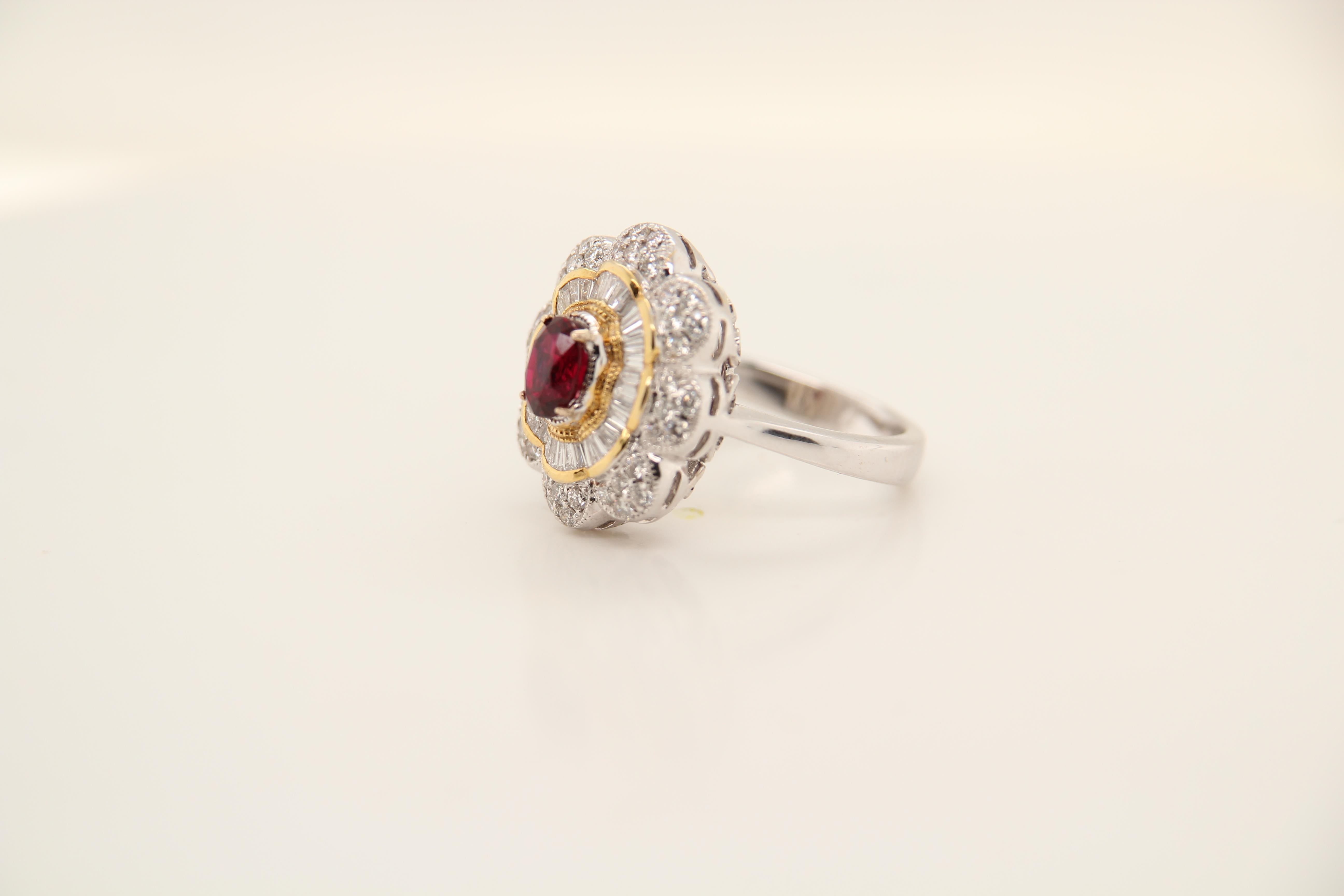 A brand new handcrafted ruby ring. The ring's center stone is 1.02 carat Burmese ruby certified by Gem Research Swisslab (GRS) as natural, unheated, 'Pigeon blood' with the certificate number: 2020-031160 The piece has been set with four claw