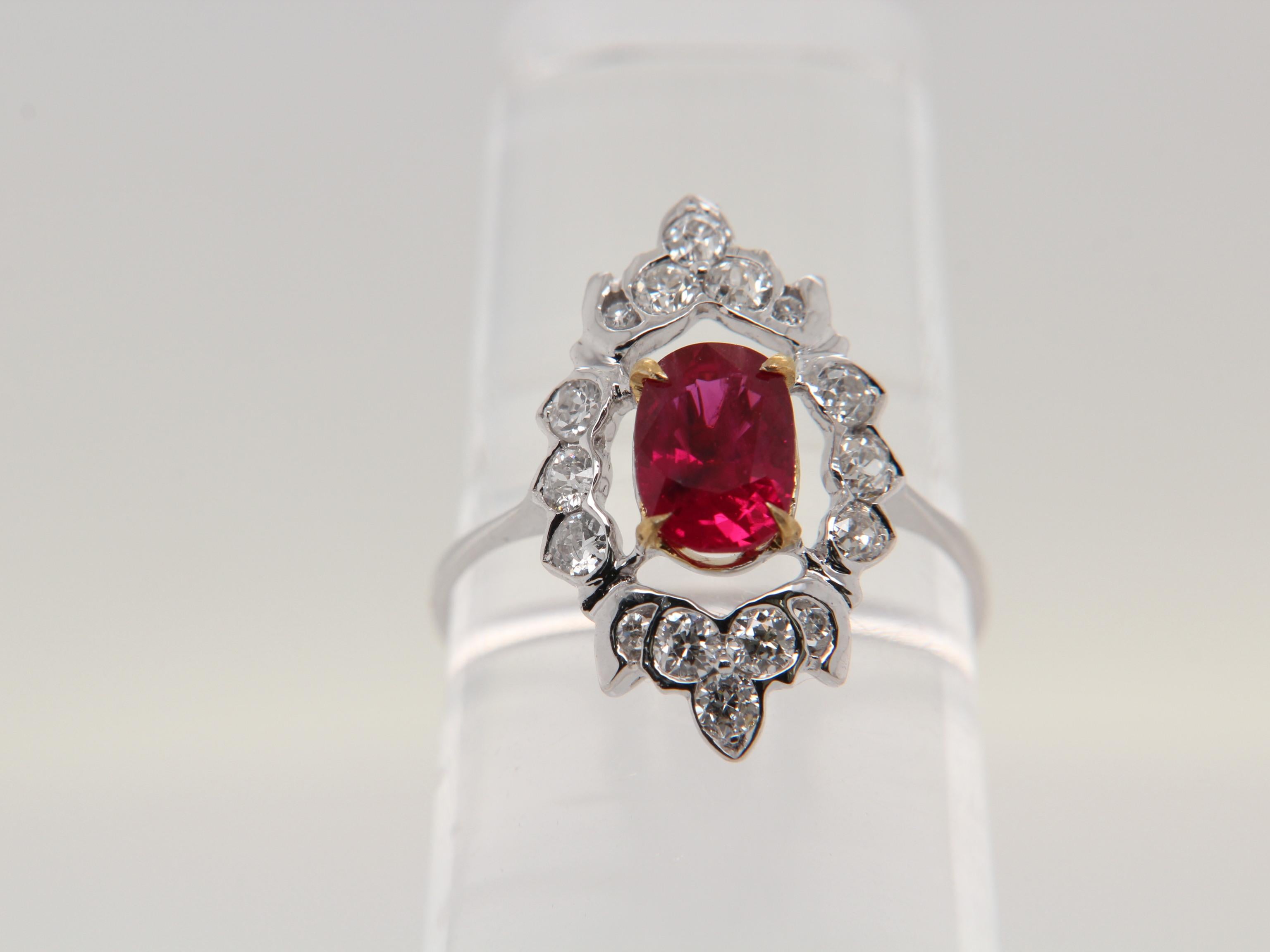 A brand new ruby and diamond ring. The ruby weighs 1.09 carat and is certified by Gem Research Swisslab (GRS) as natural, no heat, and 'Pigeon Blood'. The total diamond weight is 0.48 carat and the total ring weighs 2.85 grams