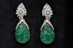 GRS Certified 112.30 Carat Zambian Pear Carved Earring